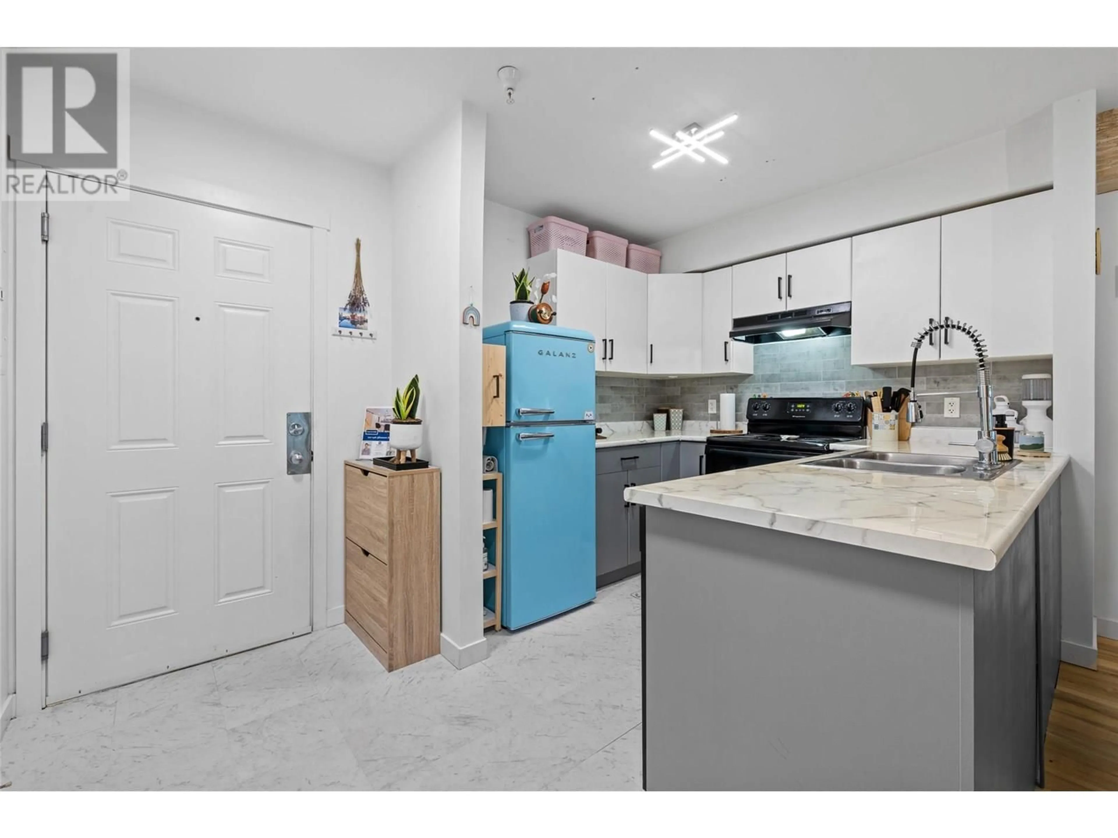 Standard kitchen, ceramic/tile floor for 210 - 1481 GLENMORE ROAD NORTH, Kelowna British Columbia V1V2C5