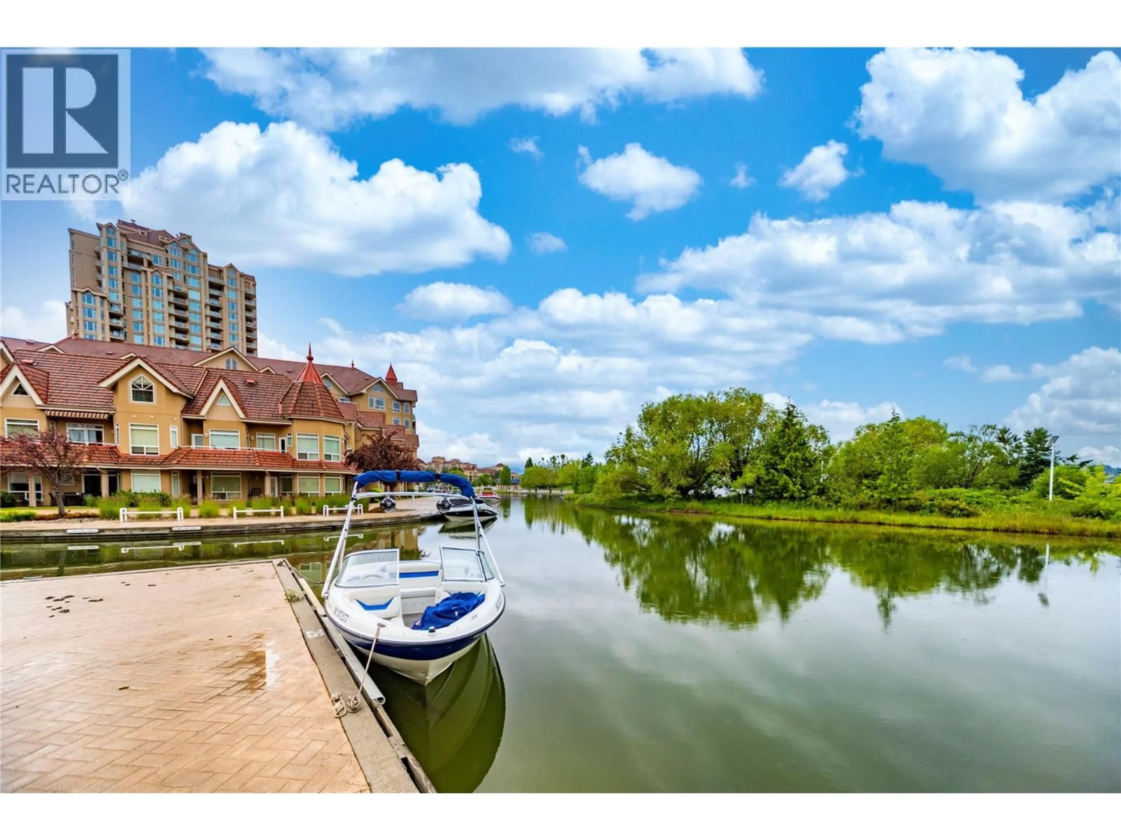 A pic from outside/outdoor area/front of a property/back of a property/a pic from drone, water/lake/river/ocean view for 310 - 1088 SUNSET DRIVE, Kelowna British Columbia V1Y9W1