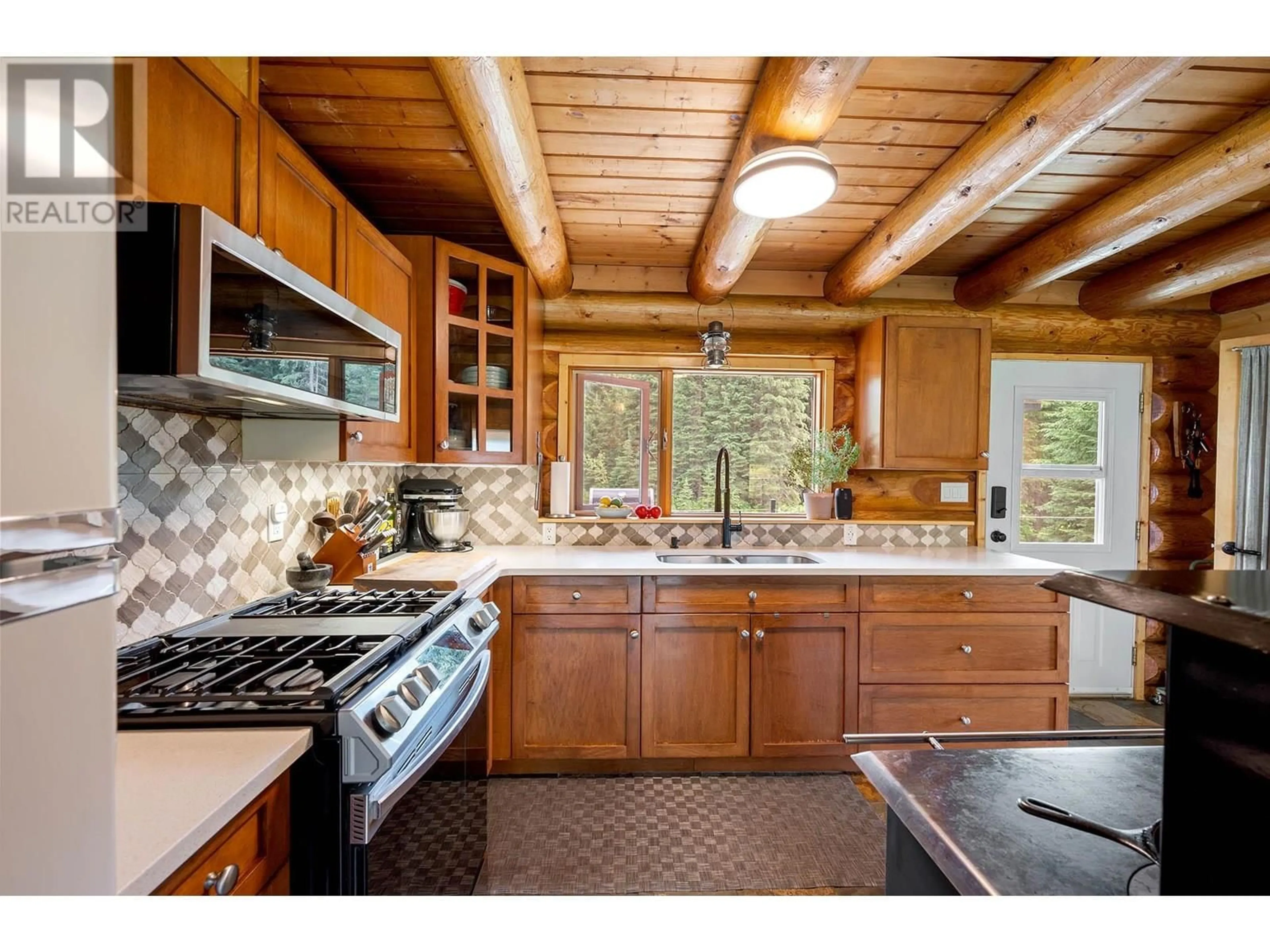 Rustic kitchen, ceramic/tile floor for 3881 MAD RIVER FOREST, Vavenby British Columbia V0E3A0