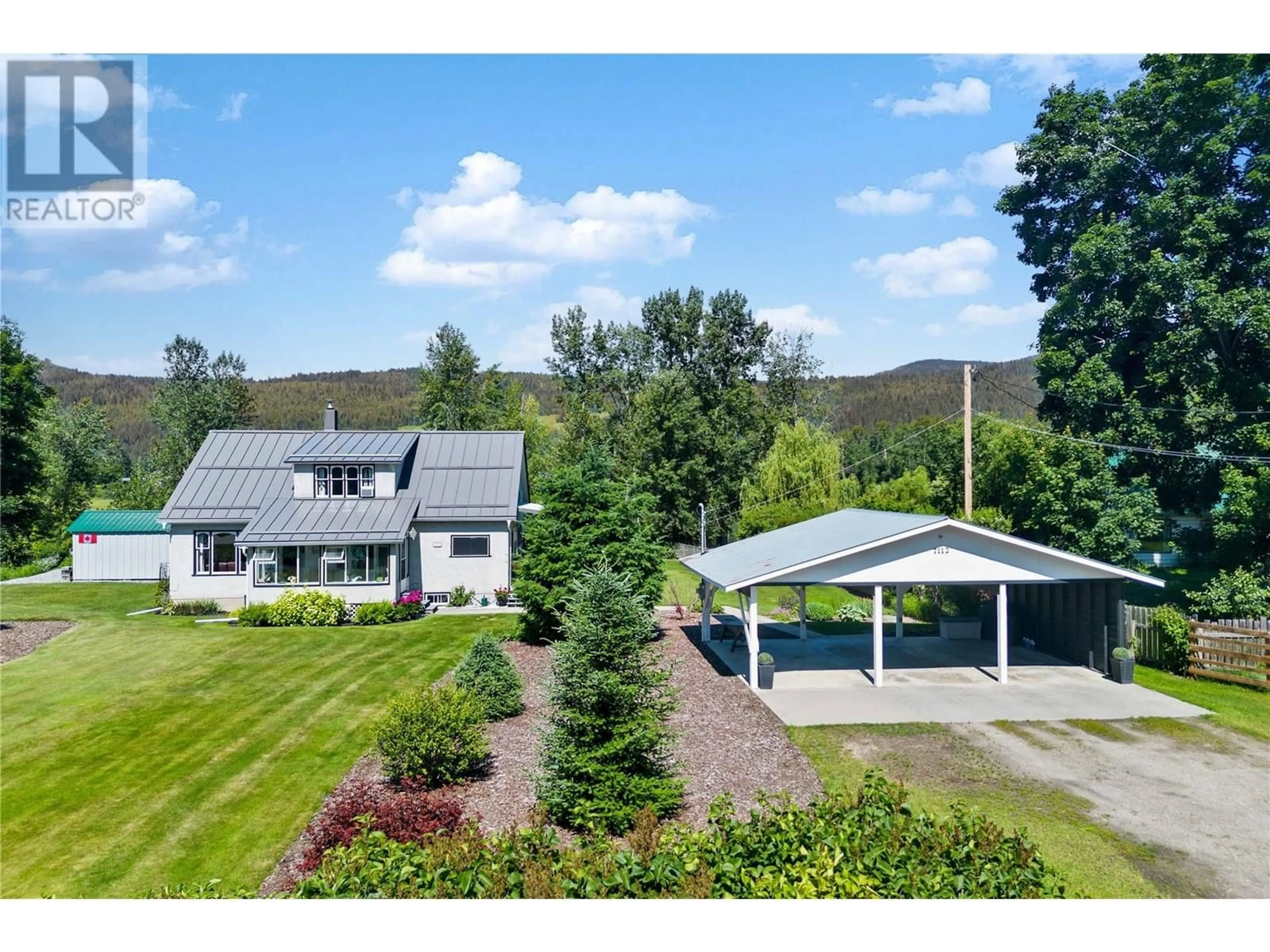 A pic from outside/outdoor area/front of a property/back of a property/a pic from drone, mountain view for 7112 97A HIGHWAY, Grindrod British Columbia V0E1Y0