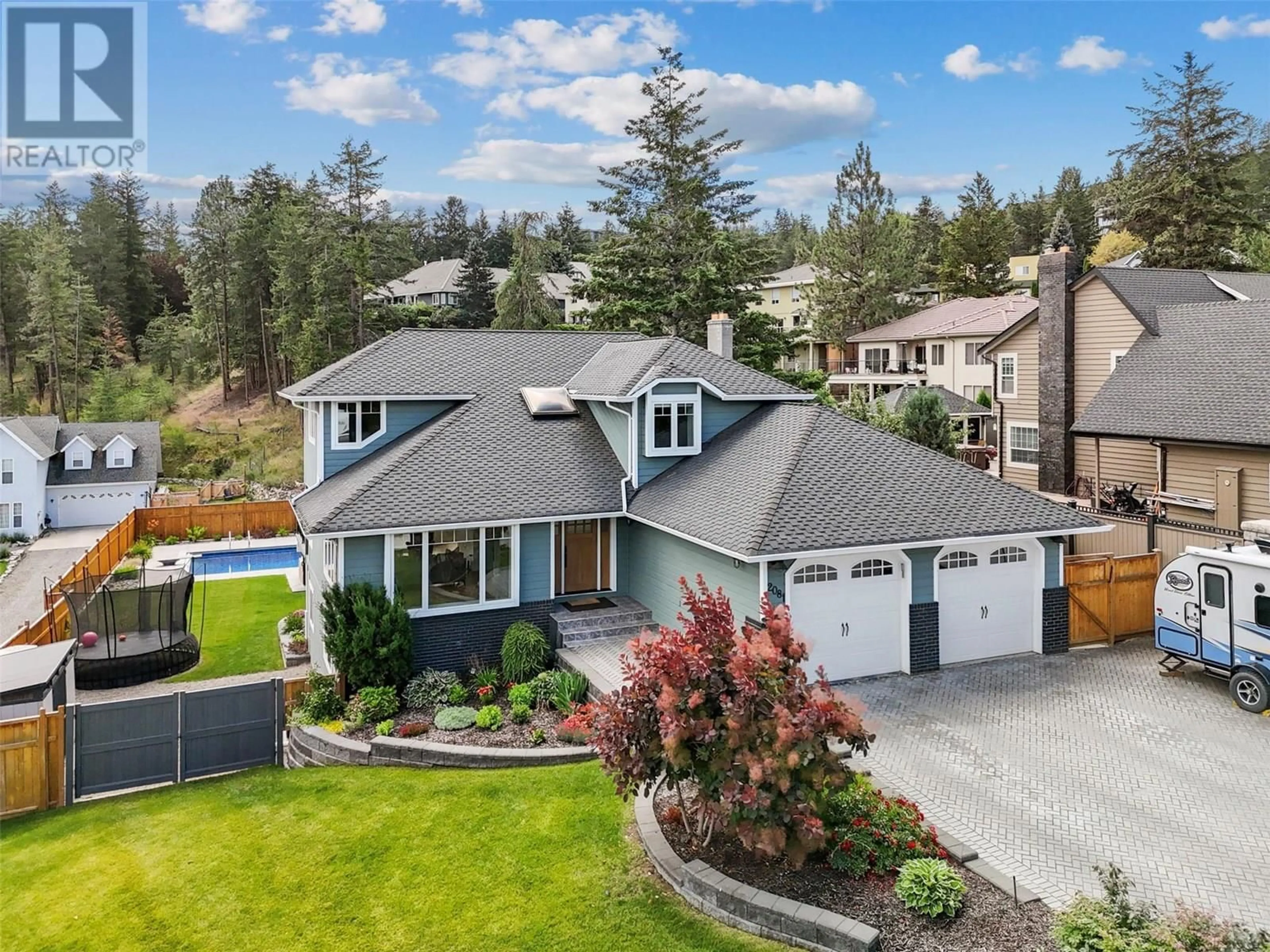 A pic from outside/outdoor area/front of a property/back of a property/a pic from drone, mountain view for 2081 GLENMOHR DRIVE, Kamloops British Columbia V1S1N4