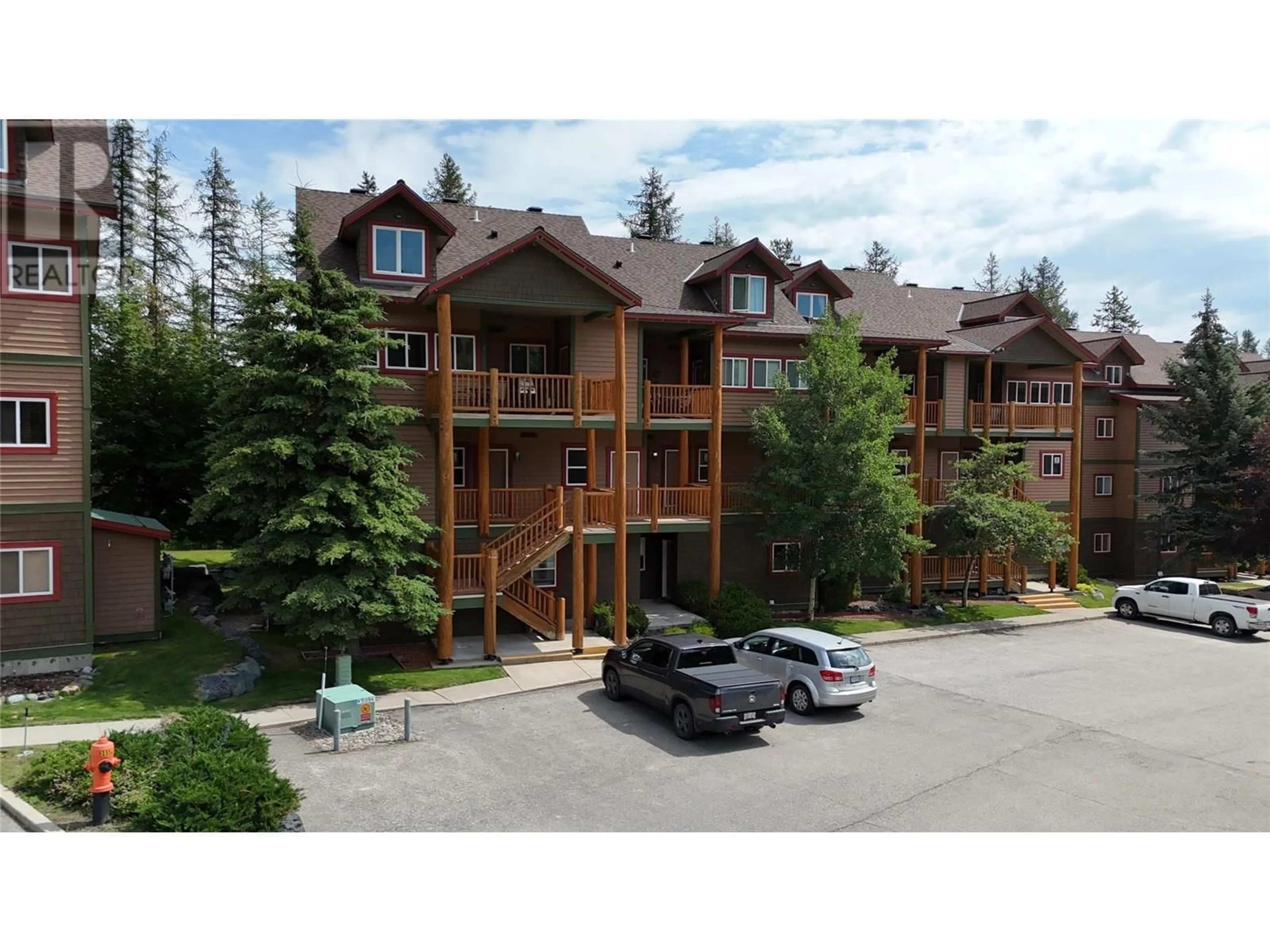 A pic from outside/outdoor area/front of a property/back of a property/a pic from drone, mountain view for 307 - 300 STEMWINDER DRIVE, Kimberley British Columbia V1A3E9