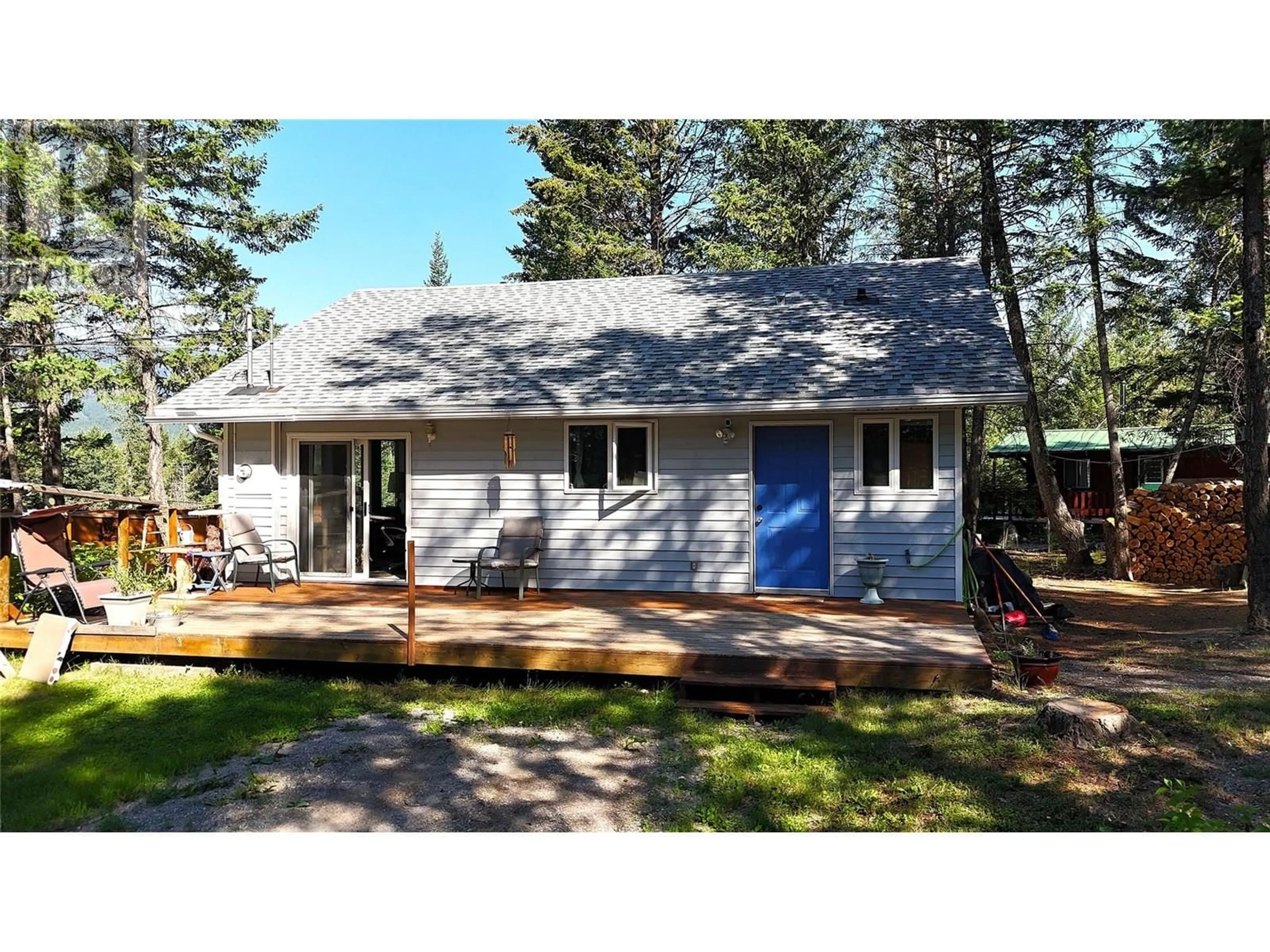 Home with vinyl exterior material, street for 4949 LUXOR CREEK ROAD, Spur Valley British Columbia V0A1E0