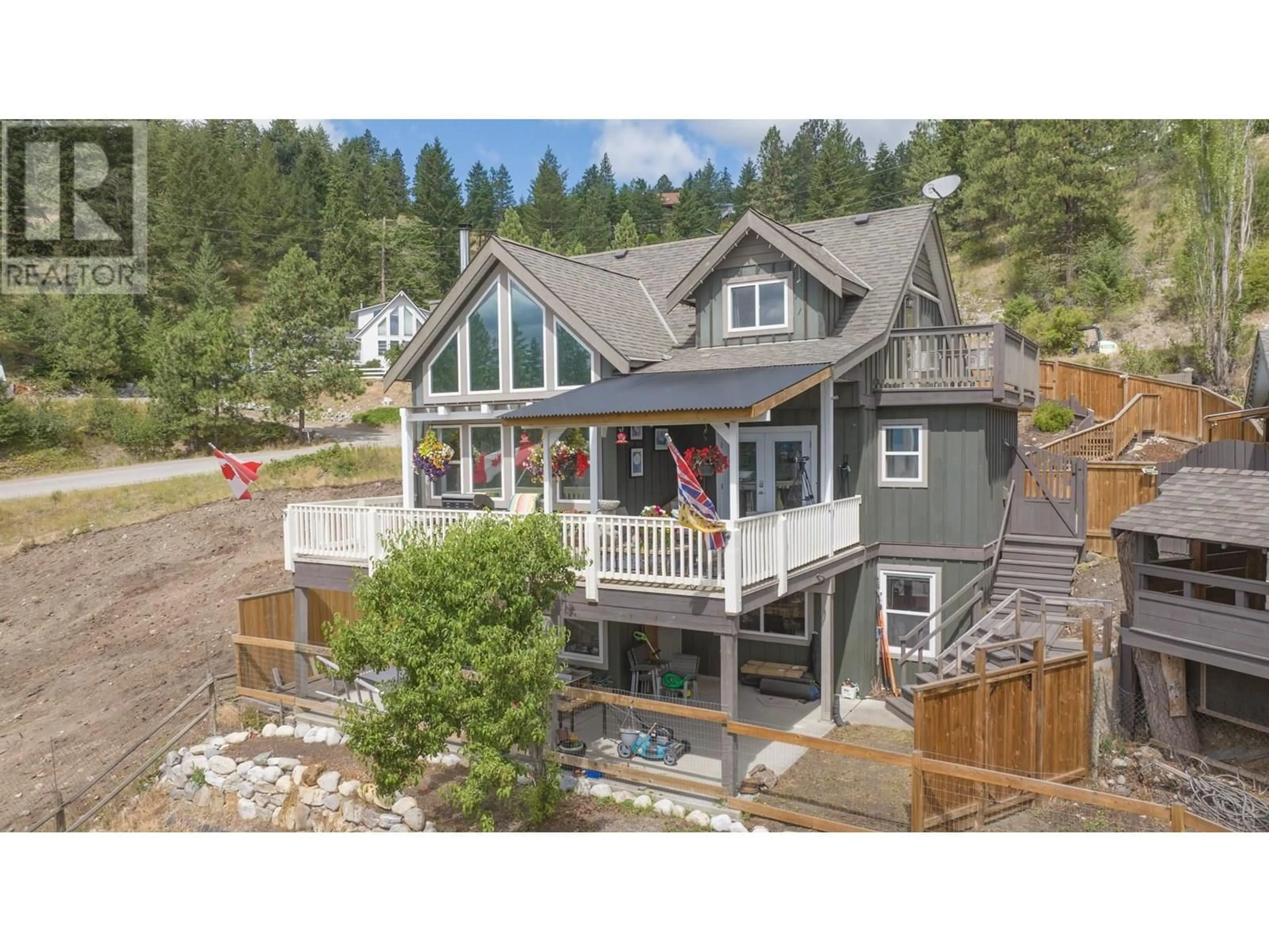 A pic from outside/outdoor area/front of a property/back of a property/a pic from drone, unknown for 10351 WESTSHORE ROAD, Vernon British Columbia V1H2B1