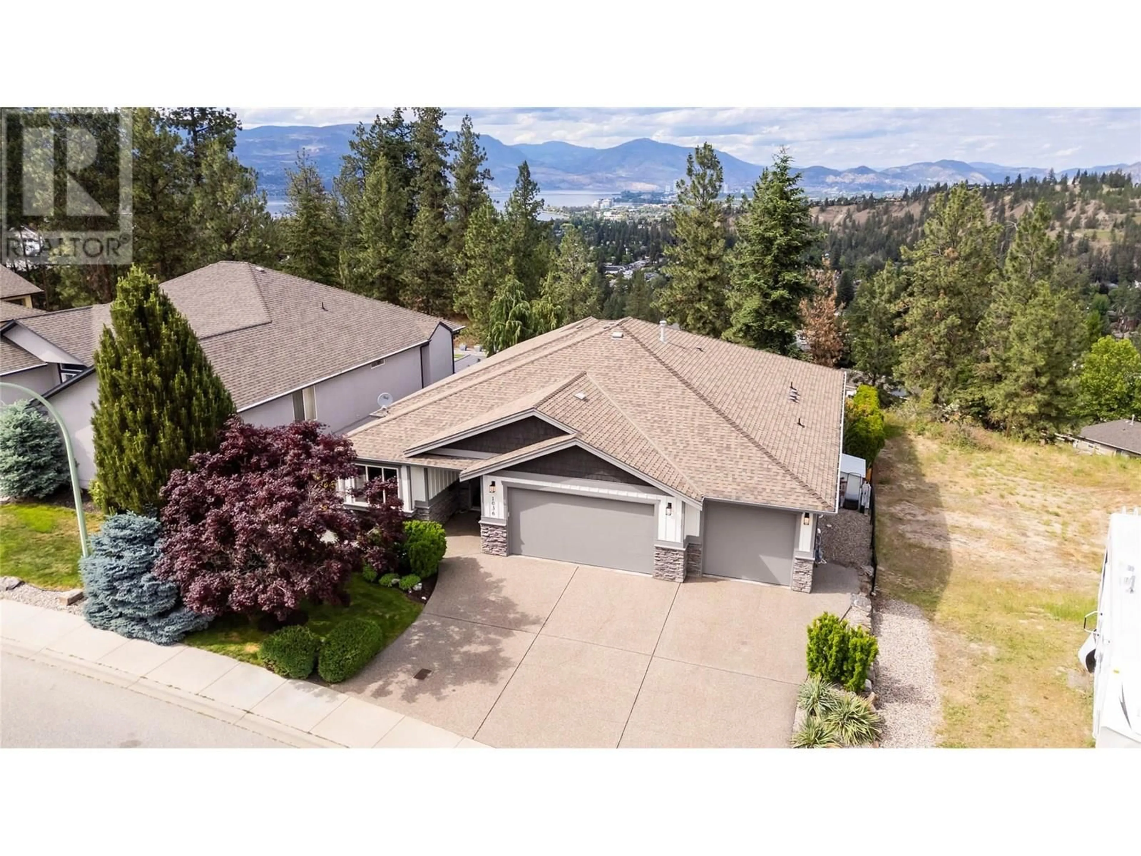 A pic from outside/outdoor area/front of a property/back of a property/a pic from drone, mountain view for 1036 ARBOR VIEW DRIVE, Kelowna British Columbia V1W5A1