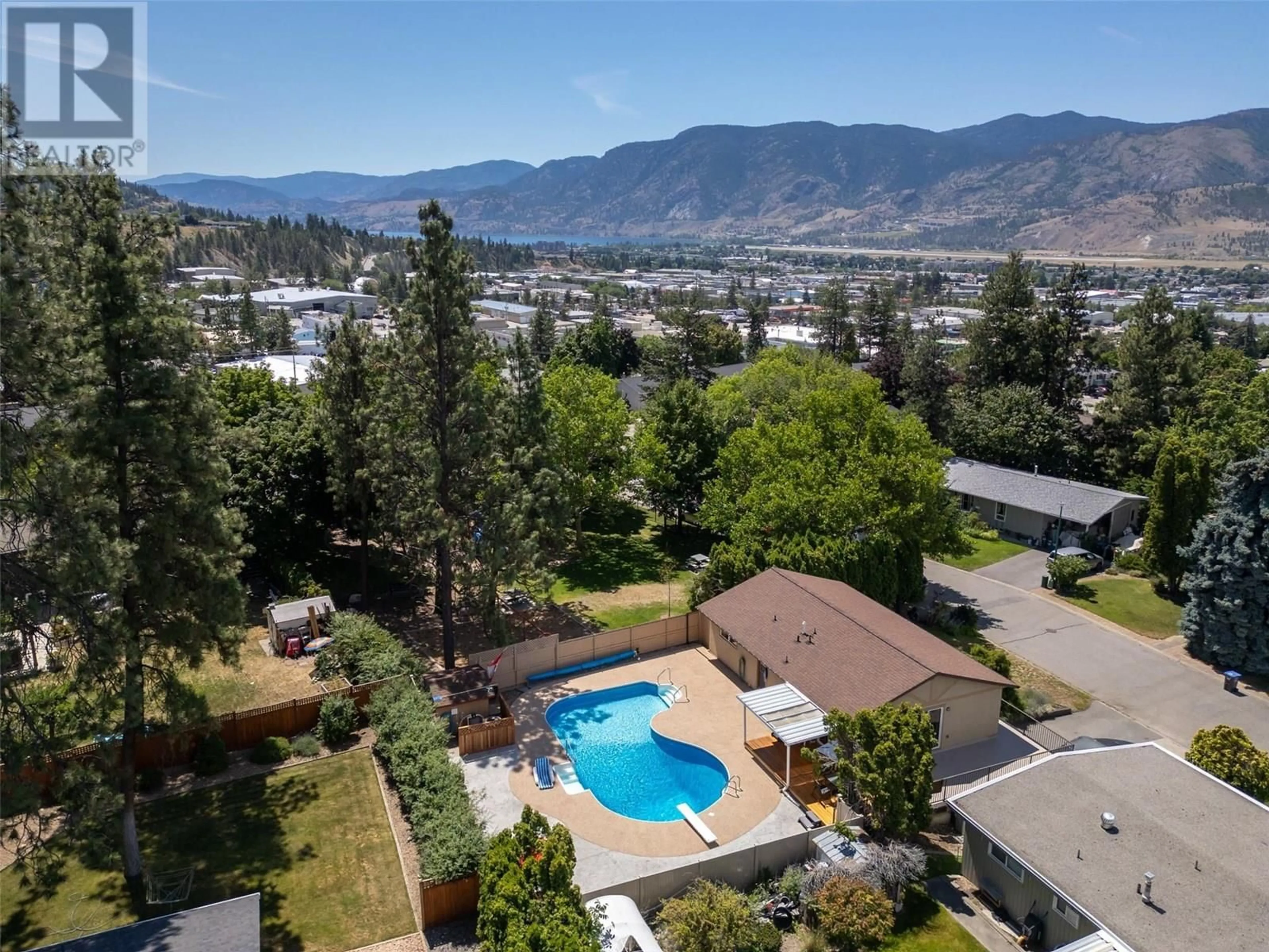 A pic from outside/outdoor area/front of a property/back of a property/a pic from drone, mountain view for 186 DUNANT CRESCENT, Penticton British Columbia V2A3G2