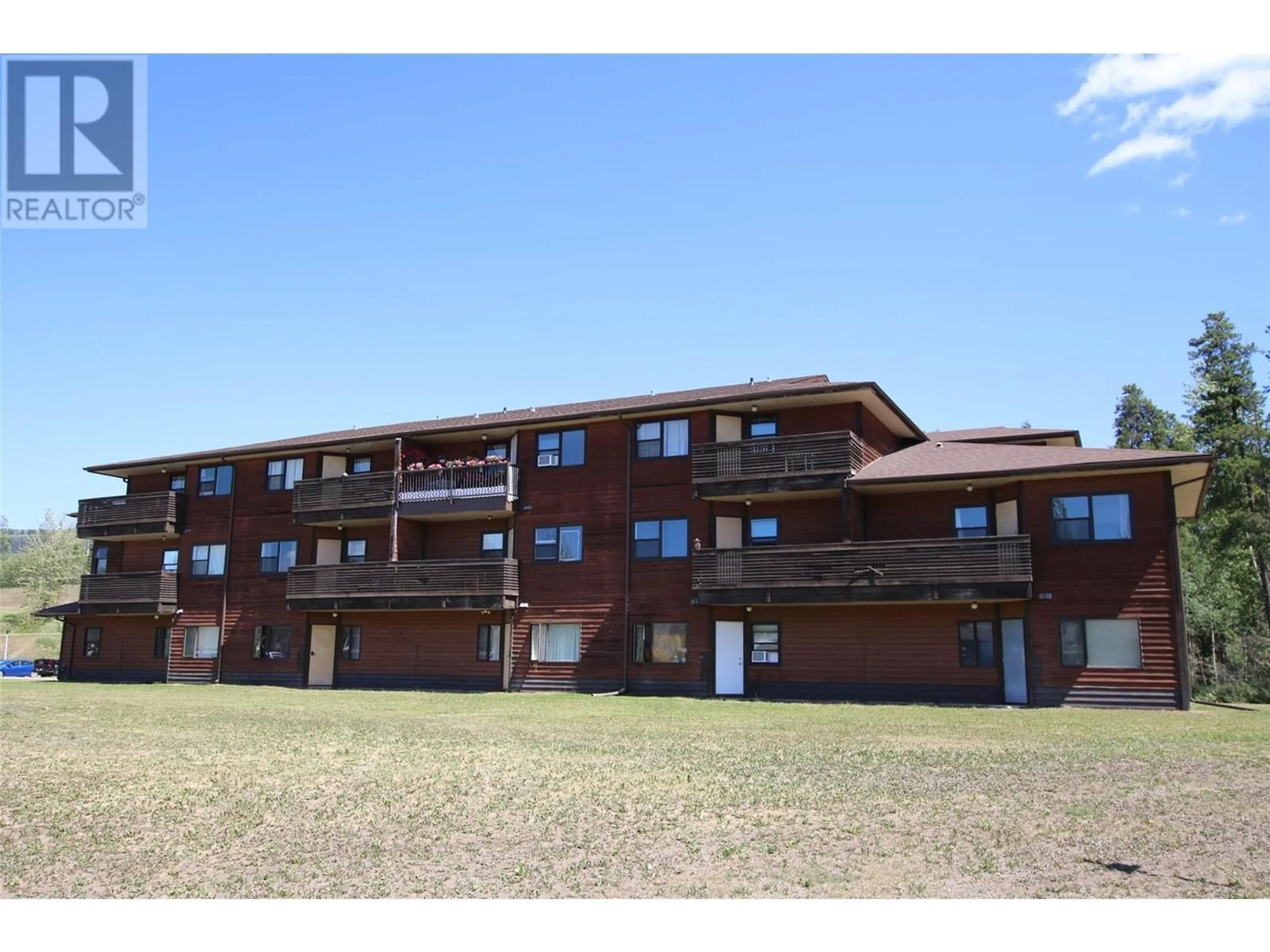 A pic from outside/outdoor area/front of a property/back of a property/a pic from drone, building for 206 - 195 CHAMBERLAIN CRESCENT, Tumbler Ridge British Columbia V0C2W0