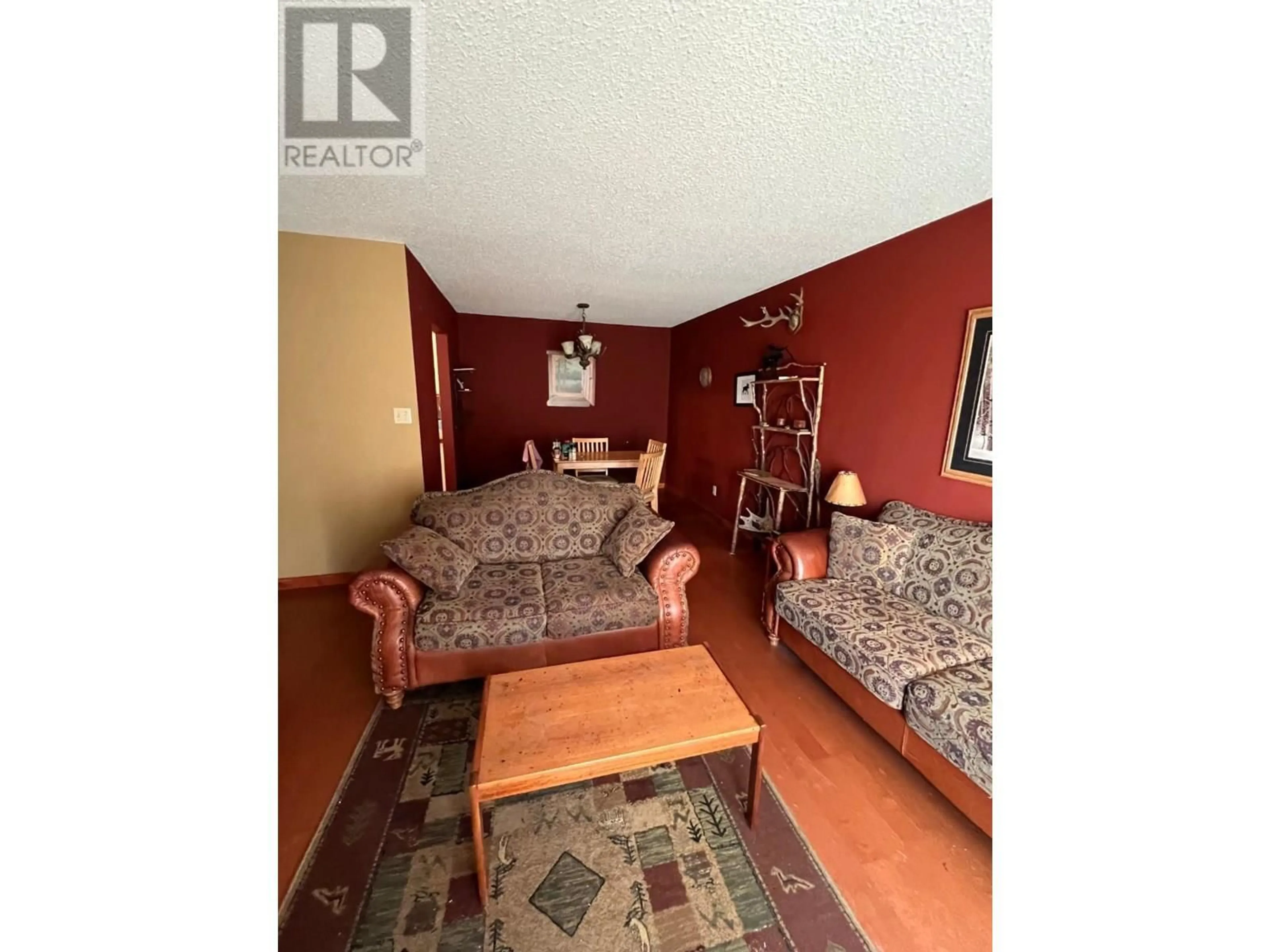 Living room with furniture, unknown for 206 - 195 CHAMBERLAIN CRESCENT, Tumbler Ridge British Columbia V0C2W0
