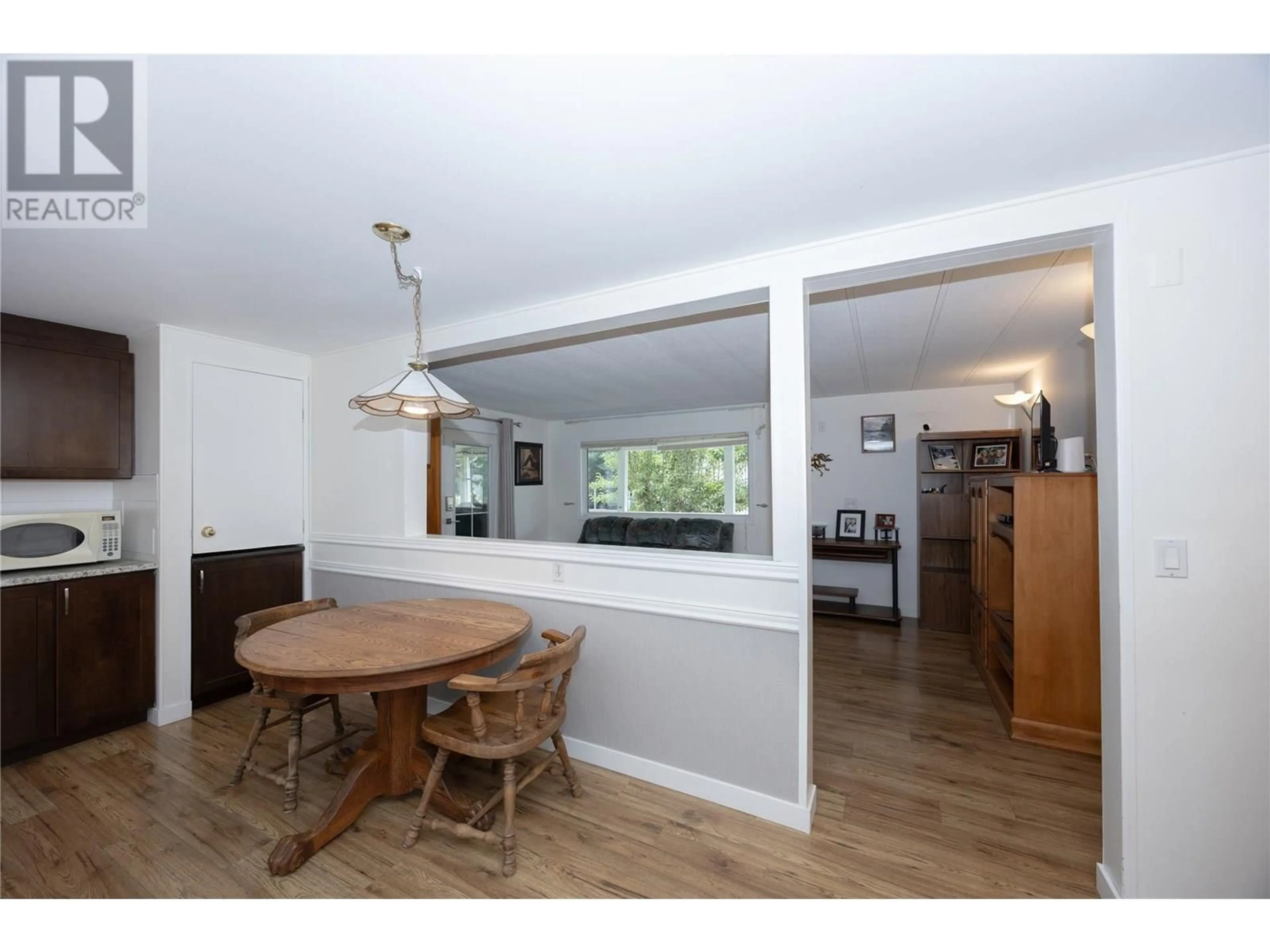 Dining room, wood/laminate floor for 85 - 3535 CASORSO ROAD, Kelowna British Columbia V1W3E1