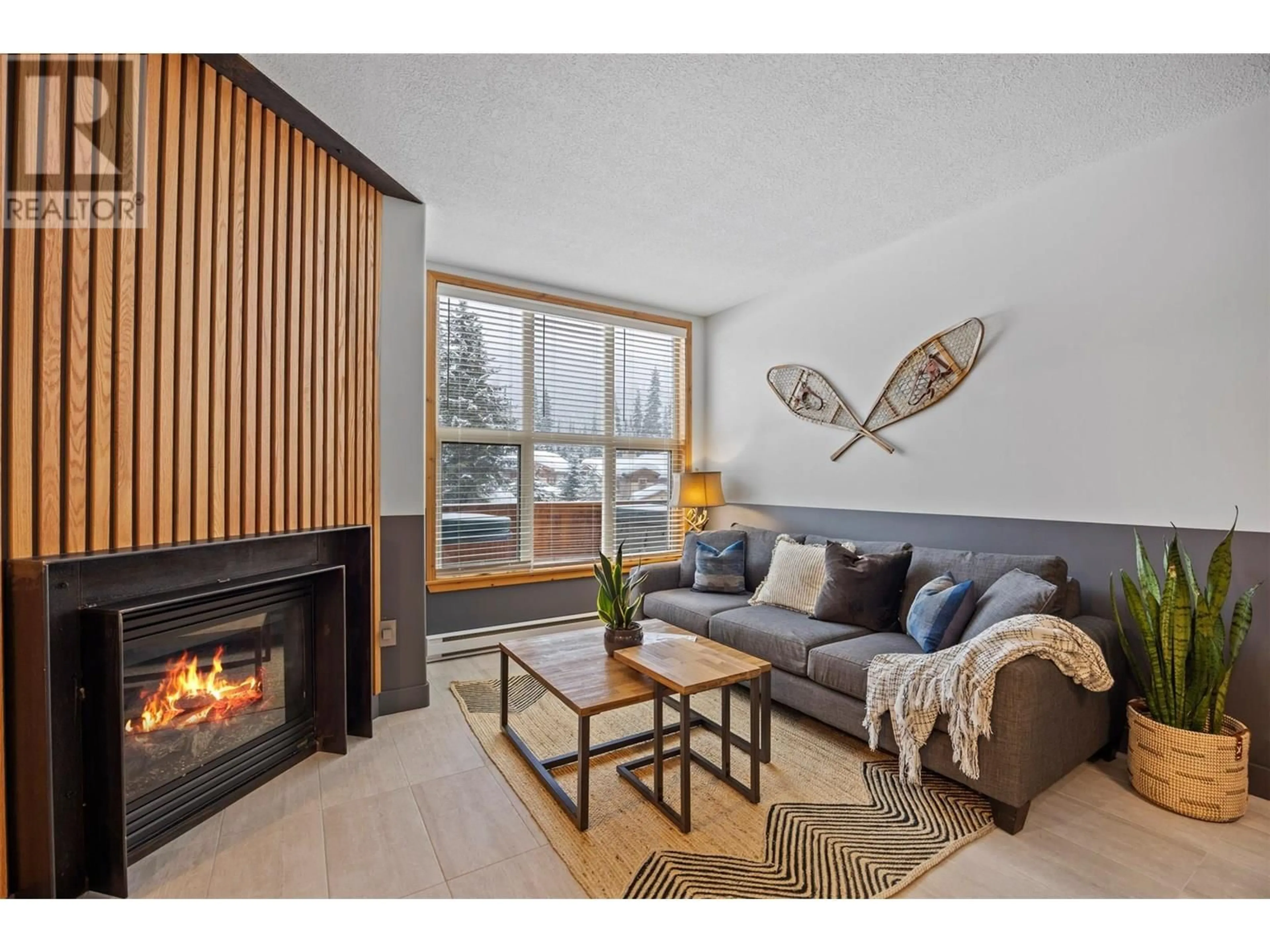 Living room with furniture, wood/laminate floor for 59 - 6005 VALLEY DRIVE, Kamloops British Columbia V0E5N0