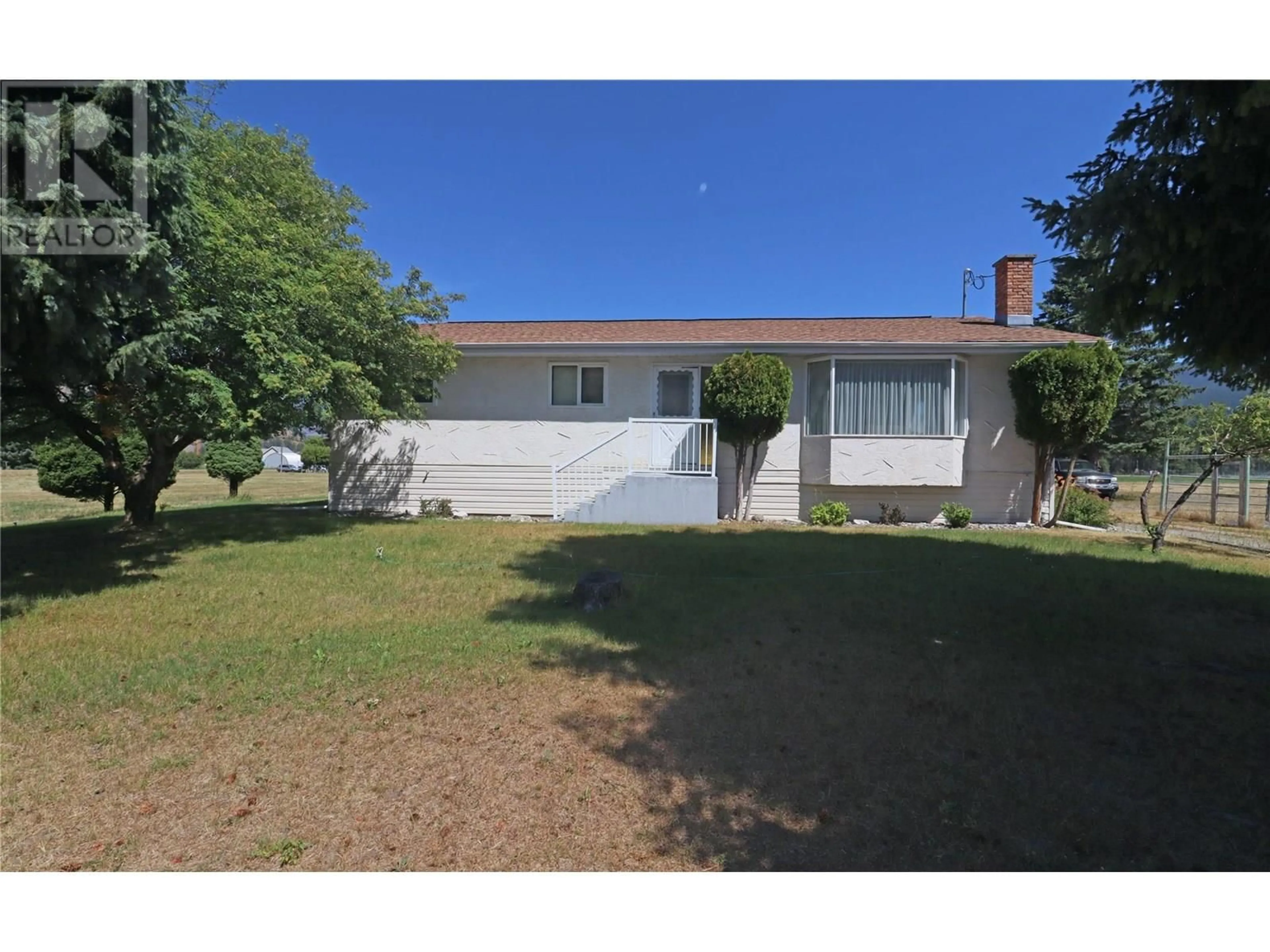 A pic from outside/outdoor area/front of a property/back of a property/a pic from drone, street for 5750 RESERVOIR ROAD, Grand Forks British Columbia V0H1H5