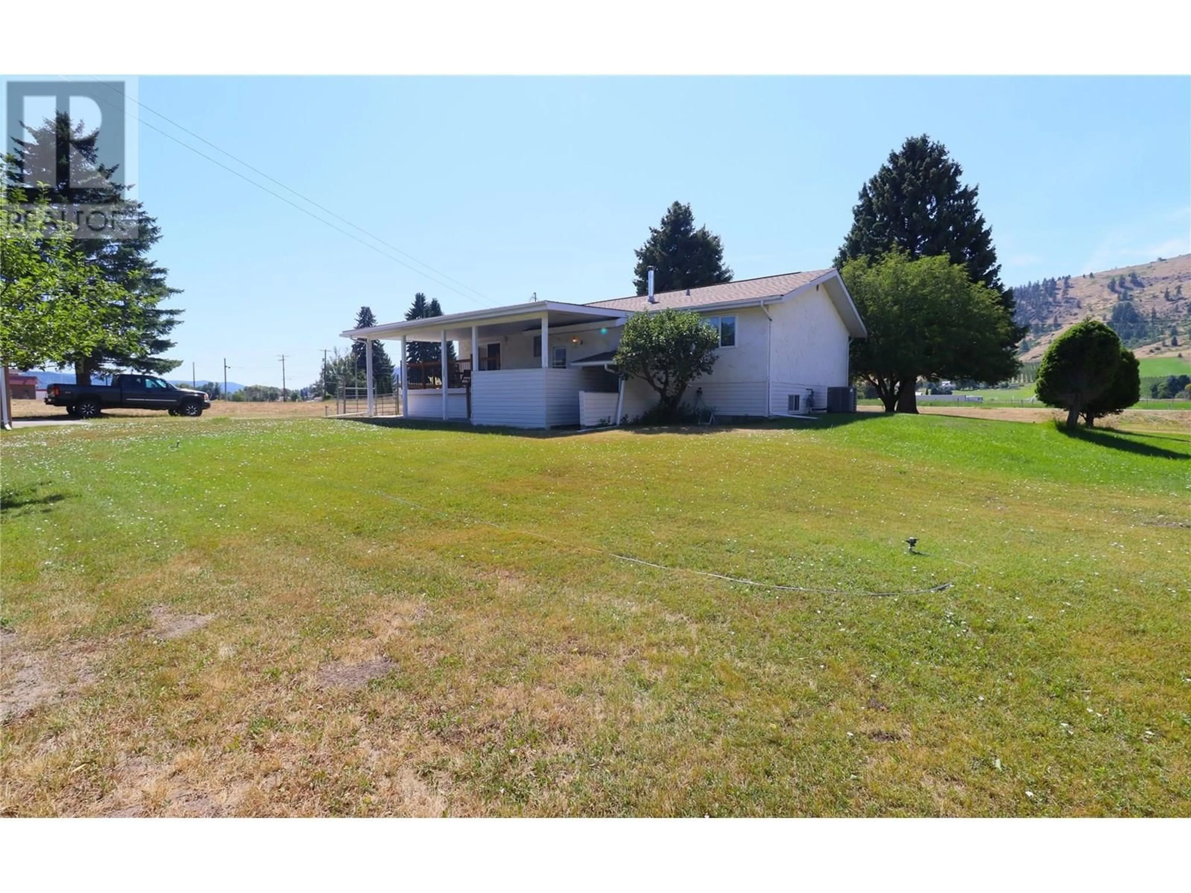 A pic from outside/outdoor area/front of a property/back of a property/a pic from drone, building for 5750 RESERVOIR ROAD, Grand Forks British Columbia V0H1H5
