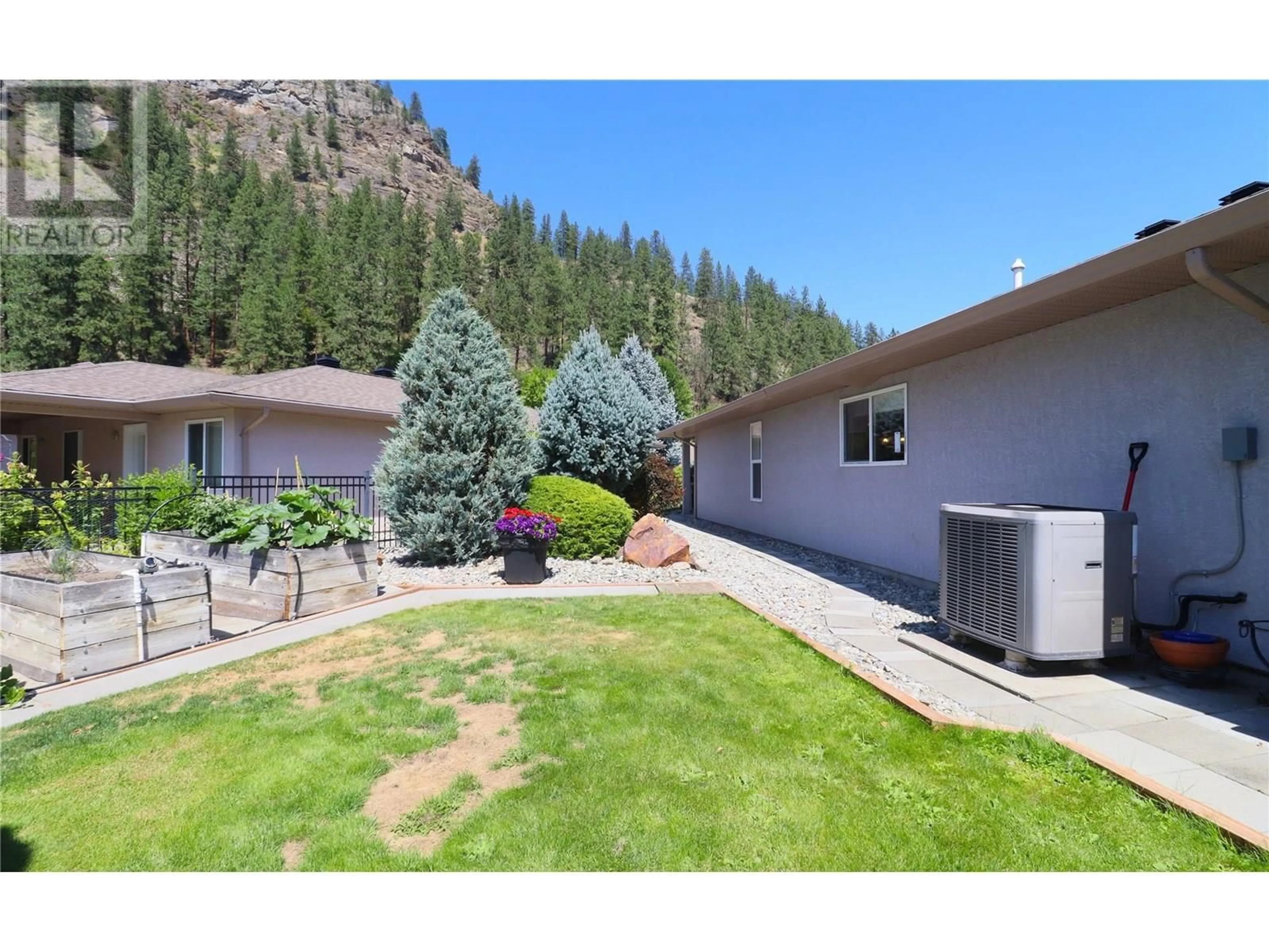 A pic from outside/outdoor area/front of a property/back of a property/a pic from drone, mountain view for 14 - 707 76TH AVENUE, Grand Forks British Columbia V0H1H0