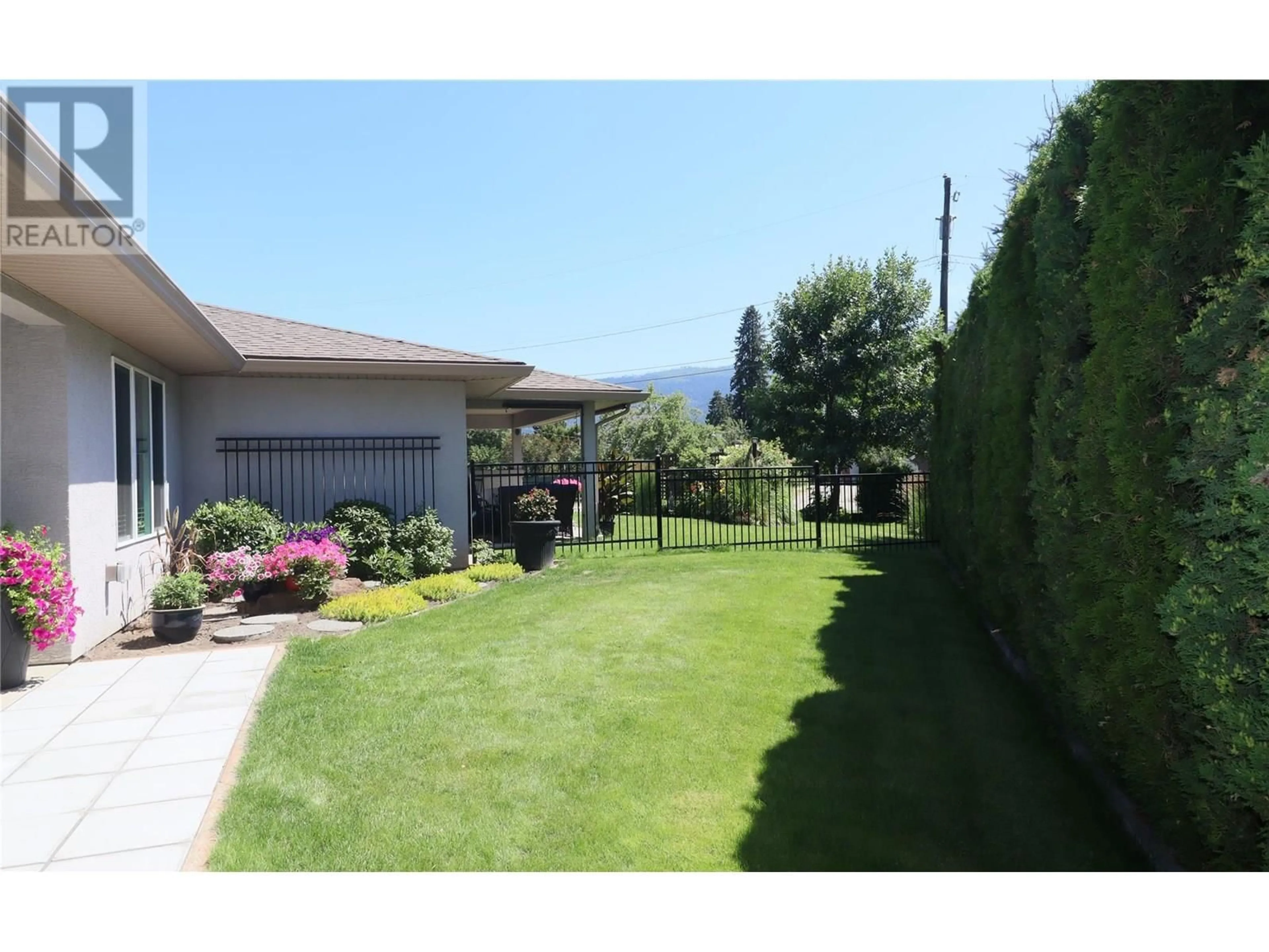 A pic from outside/outdoor area/front of a property/back of a property/a pic from drone, mountain view for 14 - 707 76TH AVENUE, Grand Forks British Columbia V0H1H0