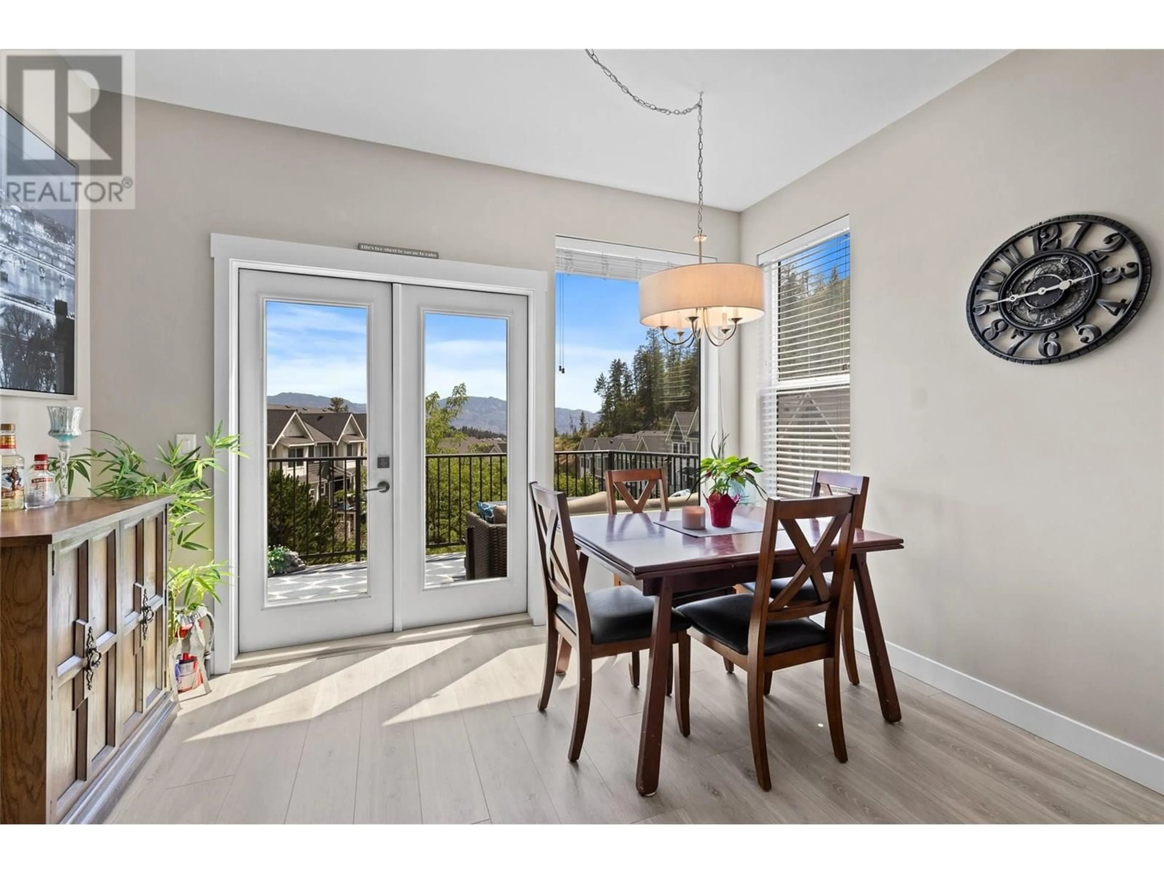 Dining room, wood/laminate floor for 61 - 2490 TUSCANY DRIVE, West Kelowna British Columbia V1T3M4