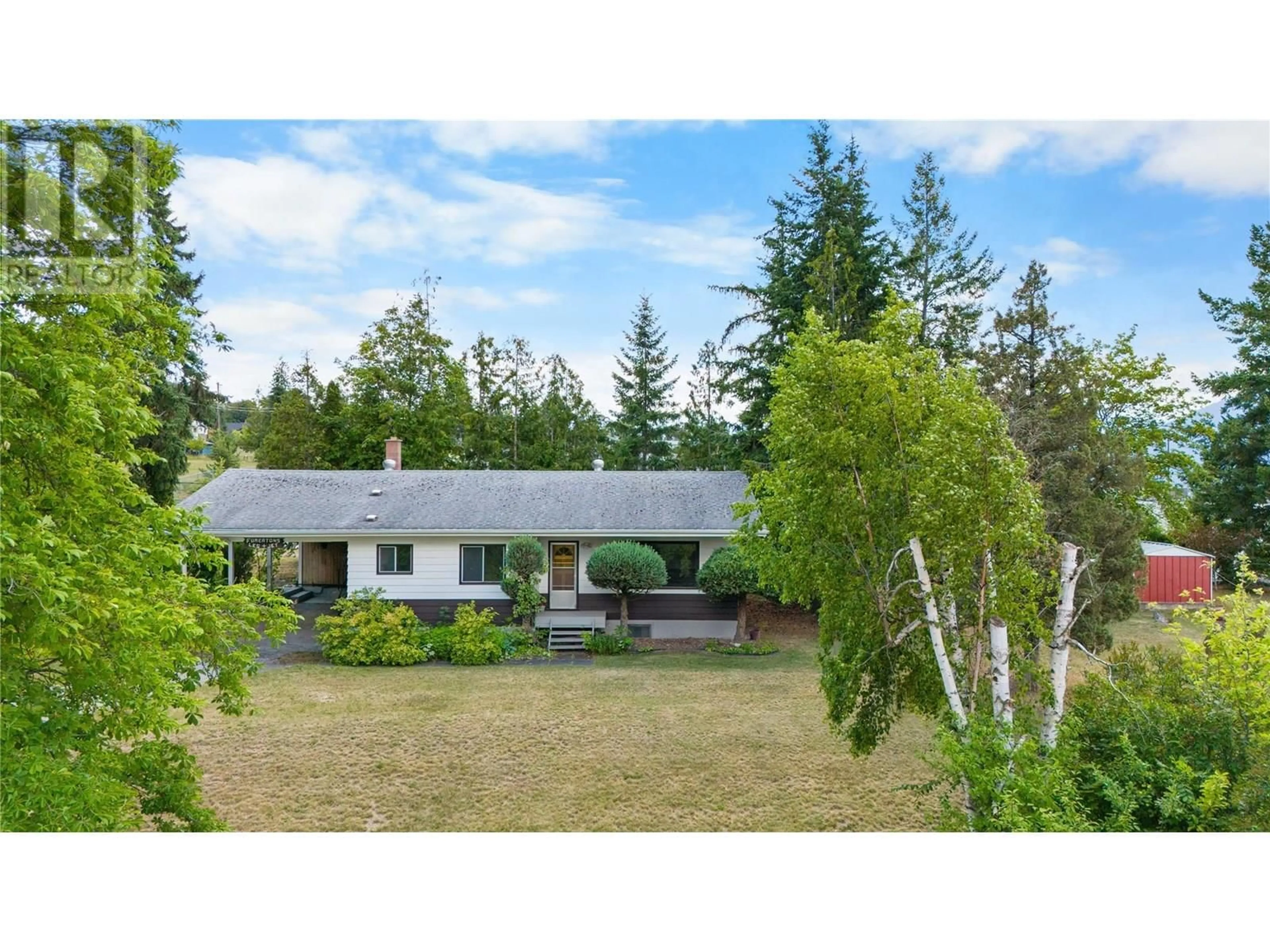 A pic from outside/outdoor area/front of a property/back of a property/a pic from drone, unknown for 1031 7TH  N AVENUE, Creston British Columbia V0B1G6