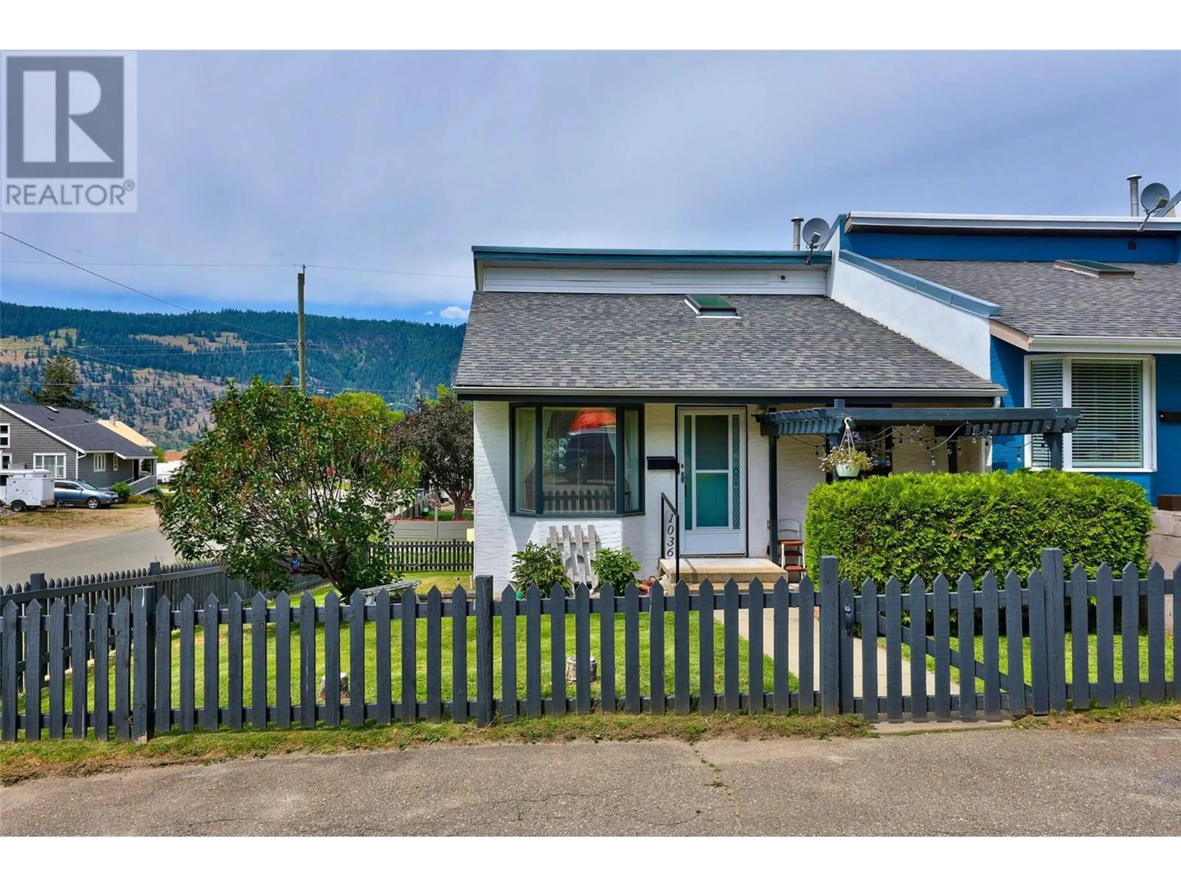 Home with vinyl exterior material, mountain view for 1036 THOMPSON AVENUE, Chase British Columbia V0E1M0