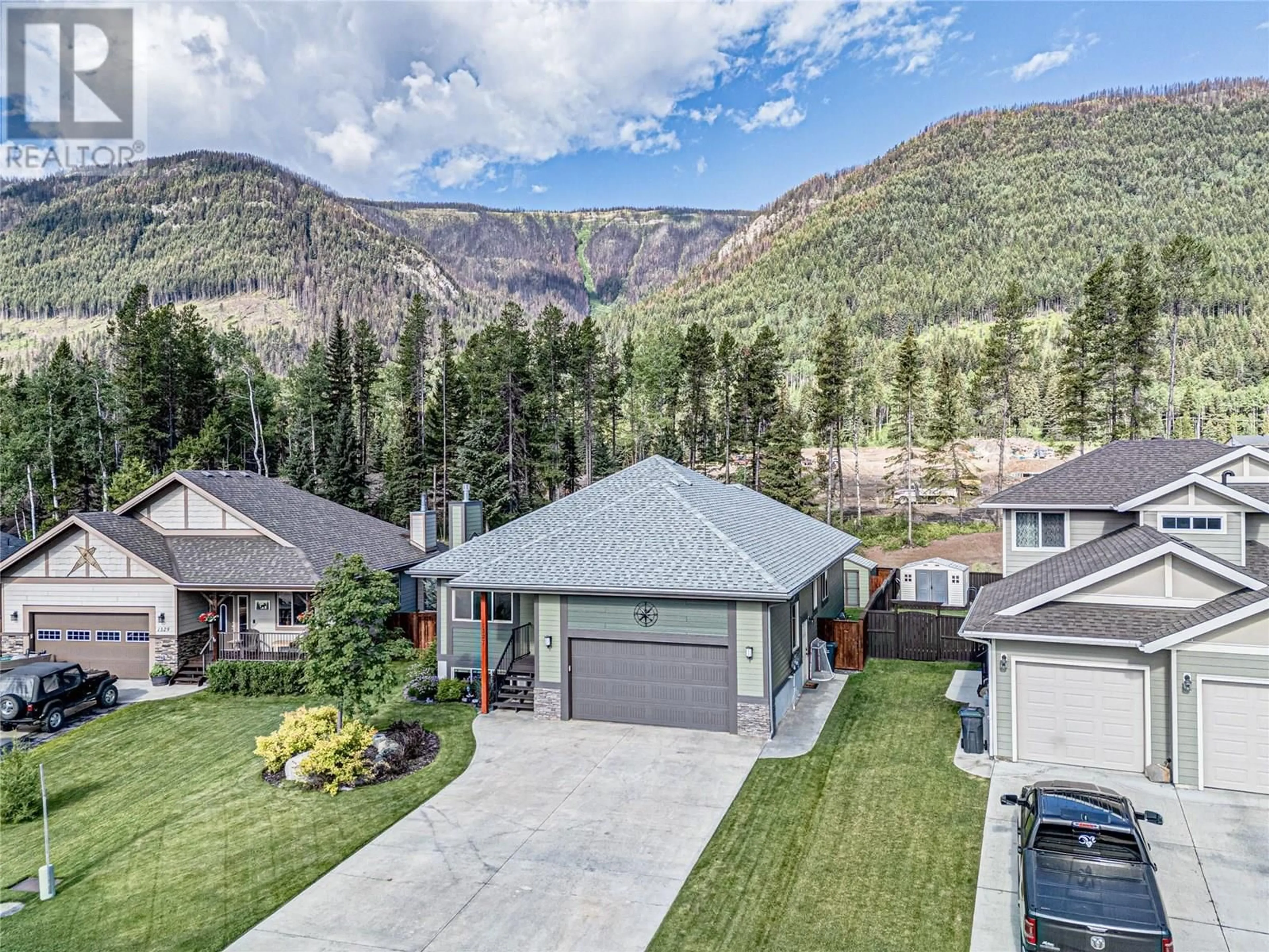 A pic from outside/outdoor area/front of a property/back of a property/a pic from drone, mountain view for 1327 CHERRYWOOD BOULEVARD, Sparwood British Columbia V0B2G2