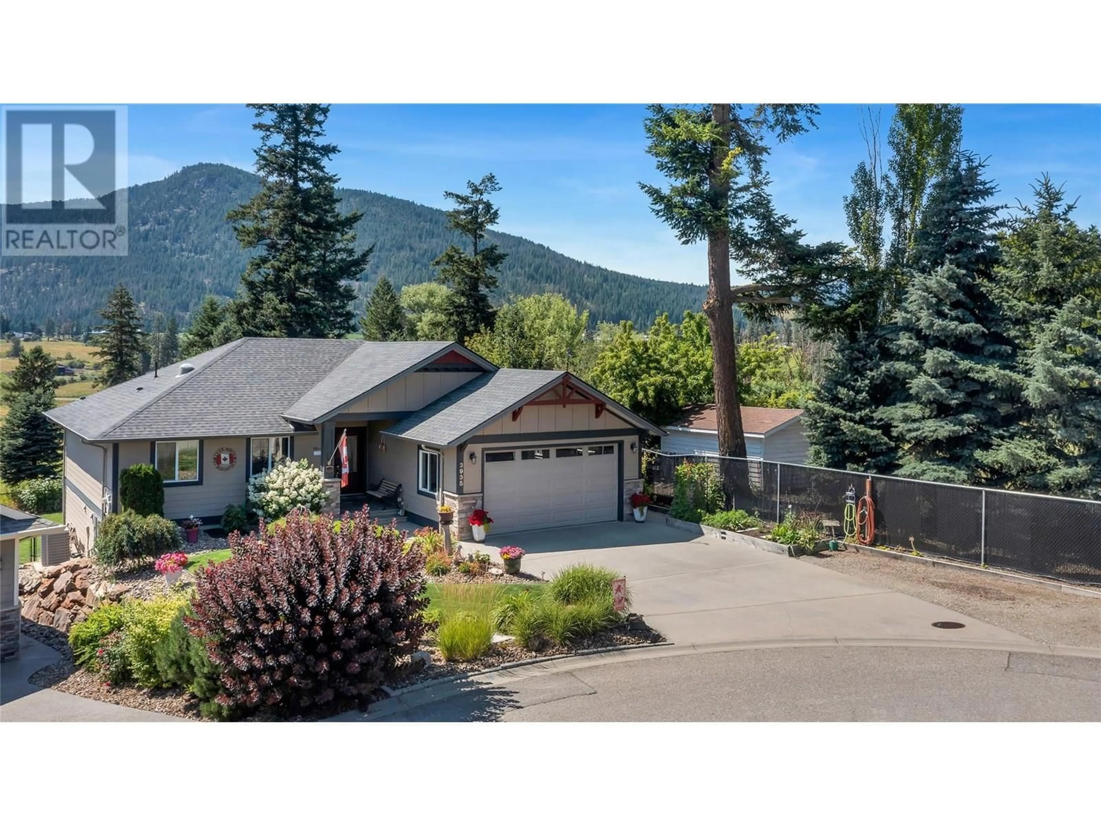 A pic from outside/outdoor area/front of a property/back of a property/a pic from drone, mountain view for 3935 POTHECARY PLACE, Armstrong British Columbia V4Y0X7