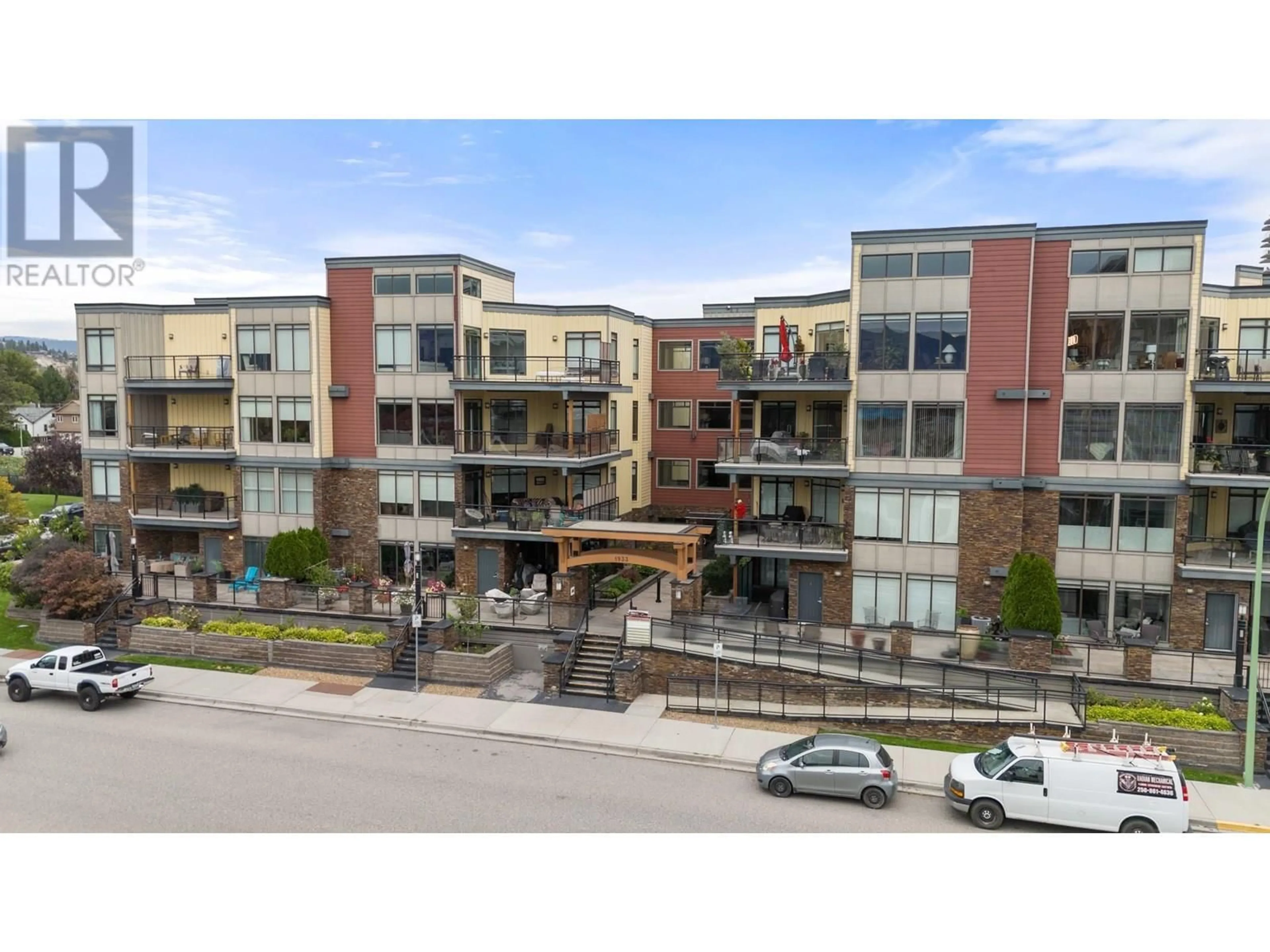 A pic from outside/outdoor area/front of a property/back of a property/a pic from drone, unknown for 302 - 1933 AMBROSI ROAD, Kelowna British Columbia V1Y4S1