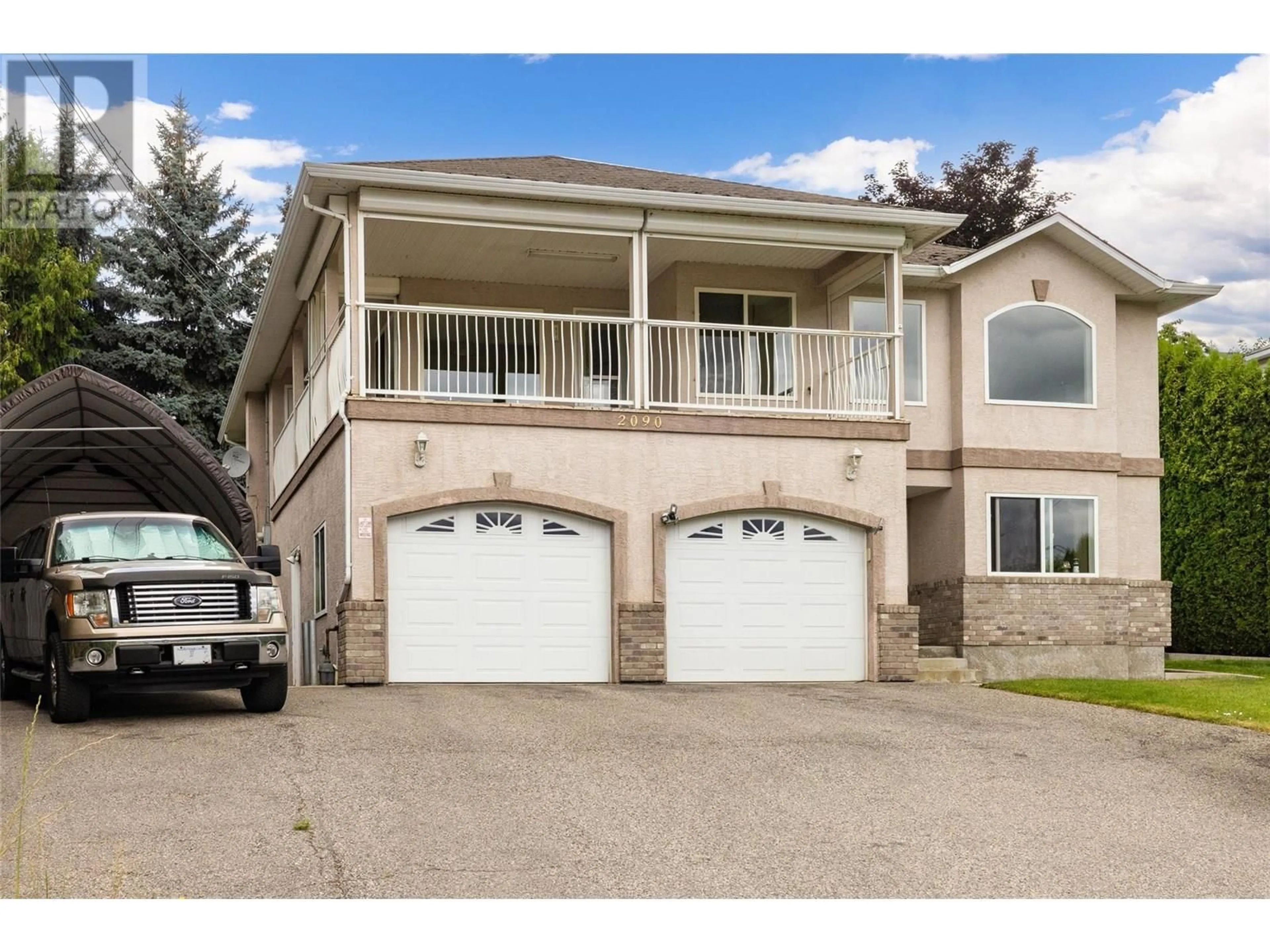 Home with vinyl exterior material, street for 2090 SHAMROCK DRIVE, West Kelowna British Columbia V4T1T8