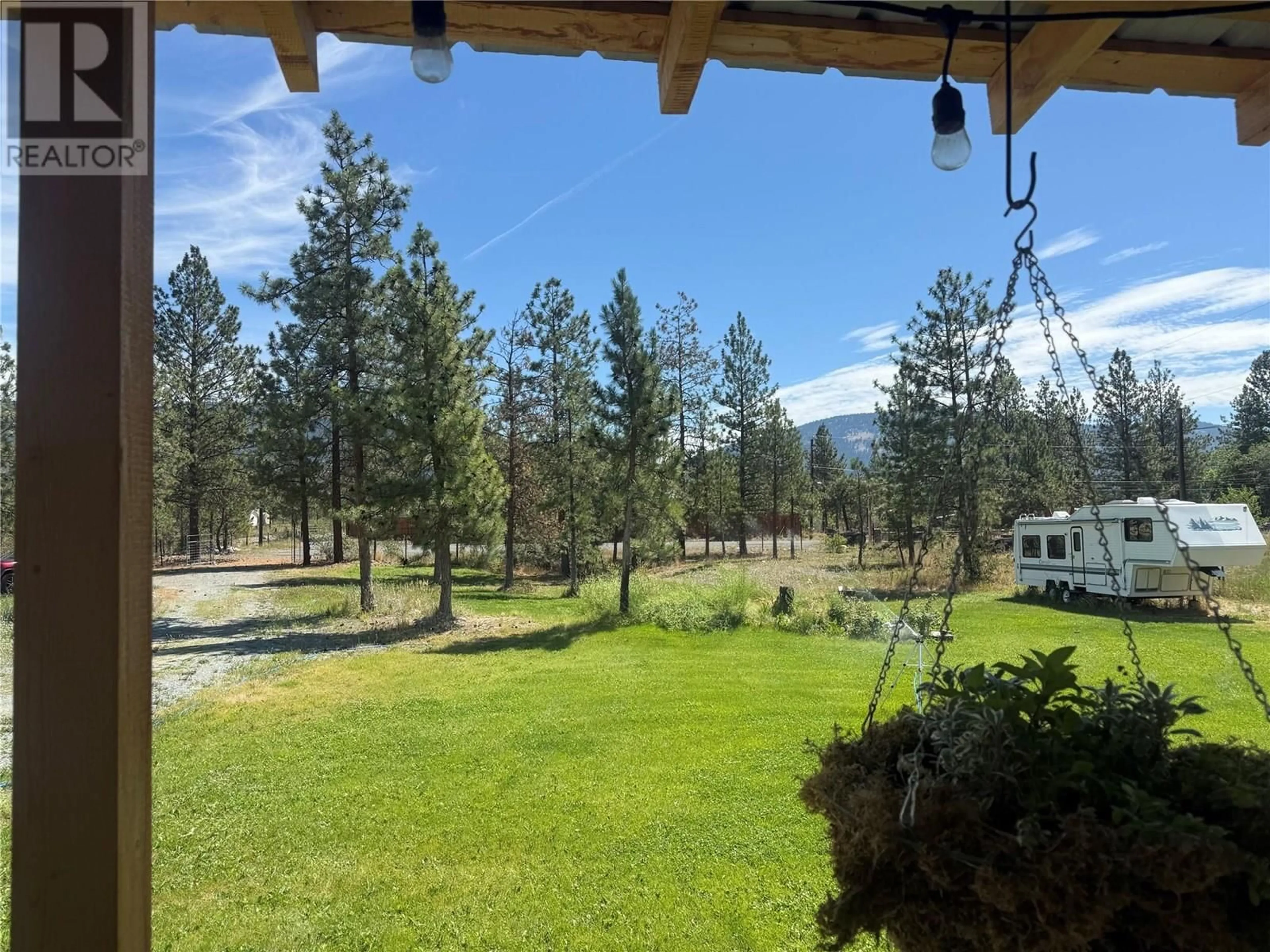 A pic from outside/outdoor area/front of a property/back of a property/a pic from drone, forest/trees view for 2711 KINVIG STREET, Merritt British Columbia V0K1Y0