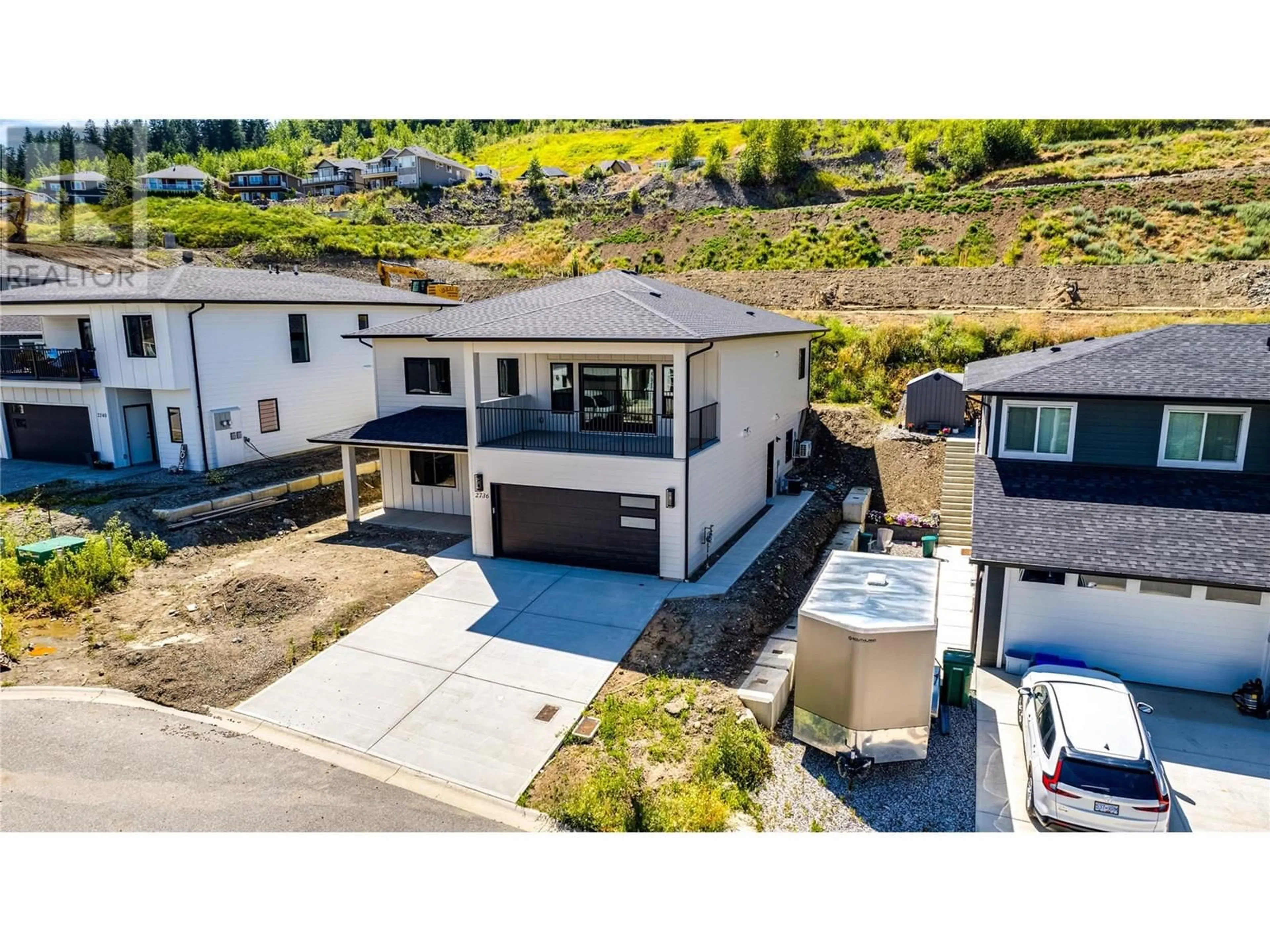 A pic from outside/outdoor area/front of a property/back of a property/a pic from drone, mountain view for 2736 CEDAR RIDGE STREET, Lumby British Columbia V0E2G5