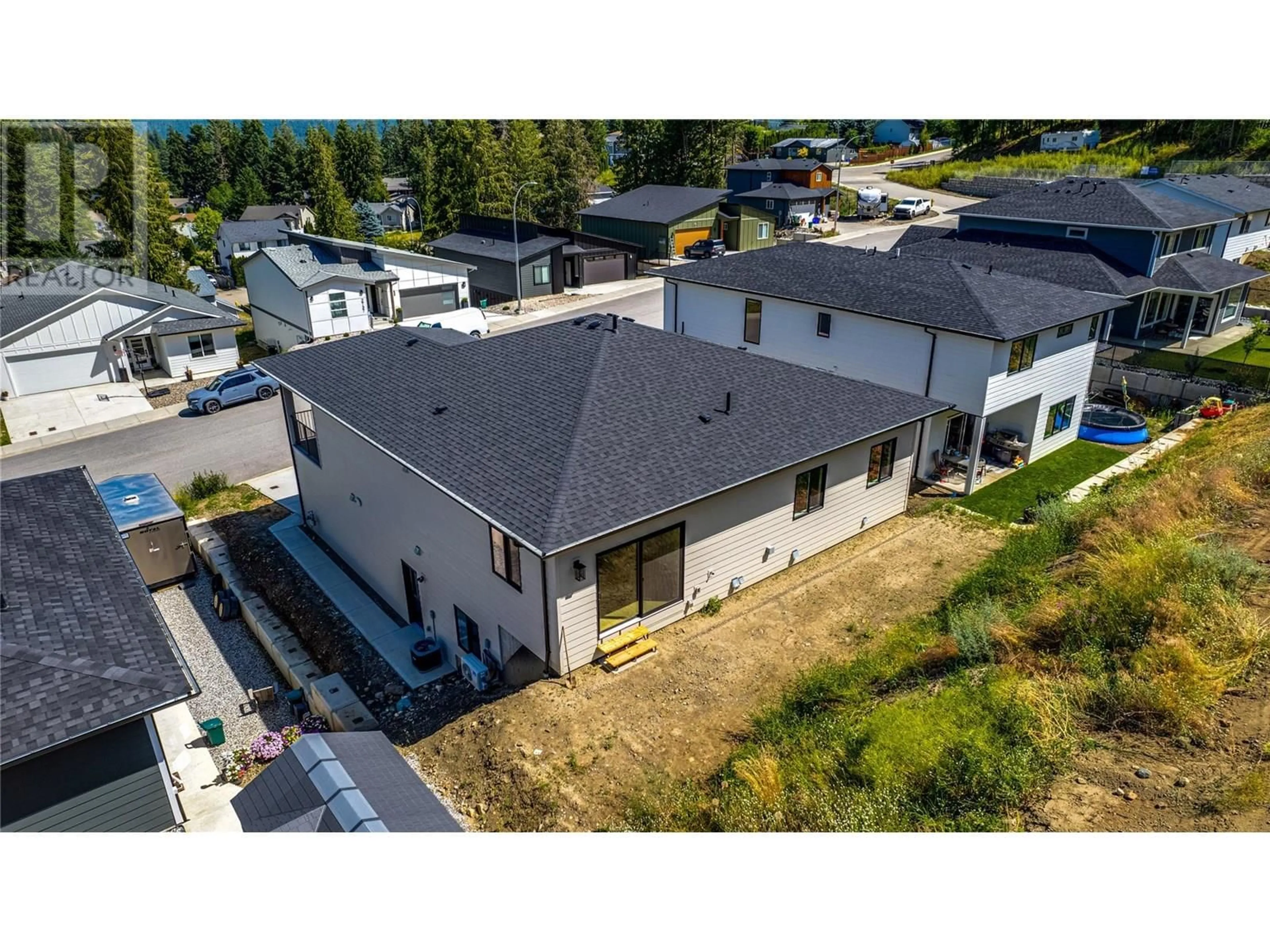A pic from outside/outdoor area/front of a property/back of a property/a pic from drone, unknown for 2736 CEDAR RIDGE STREET, Lumby British Columbia V0E2G5