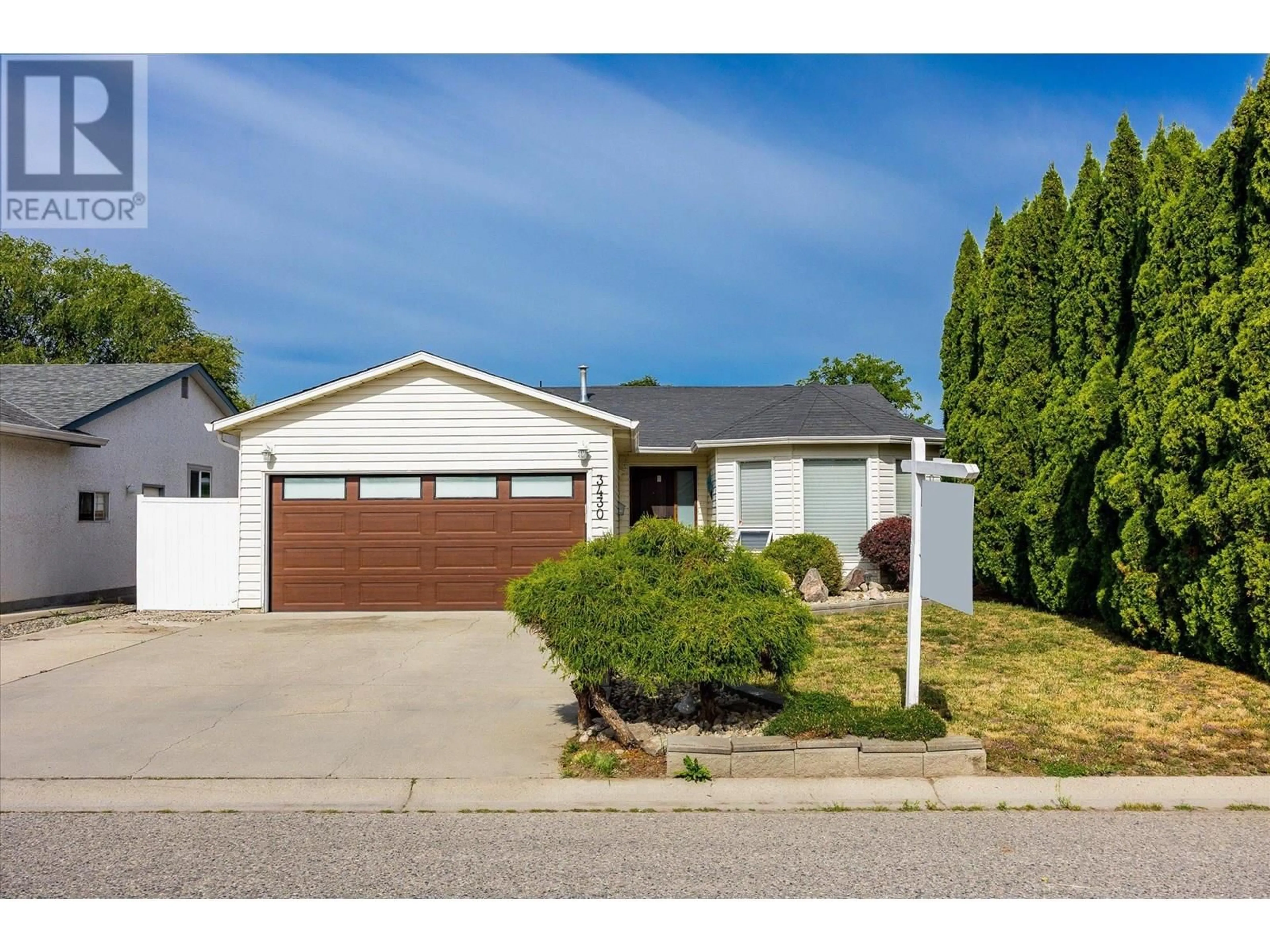 Home with vinyl exterior material, street for 3430 SILVERBERRY ROAD, Kelowna British Columbia V1W3V5