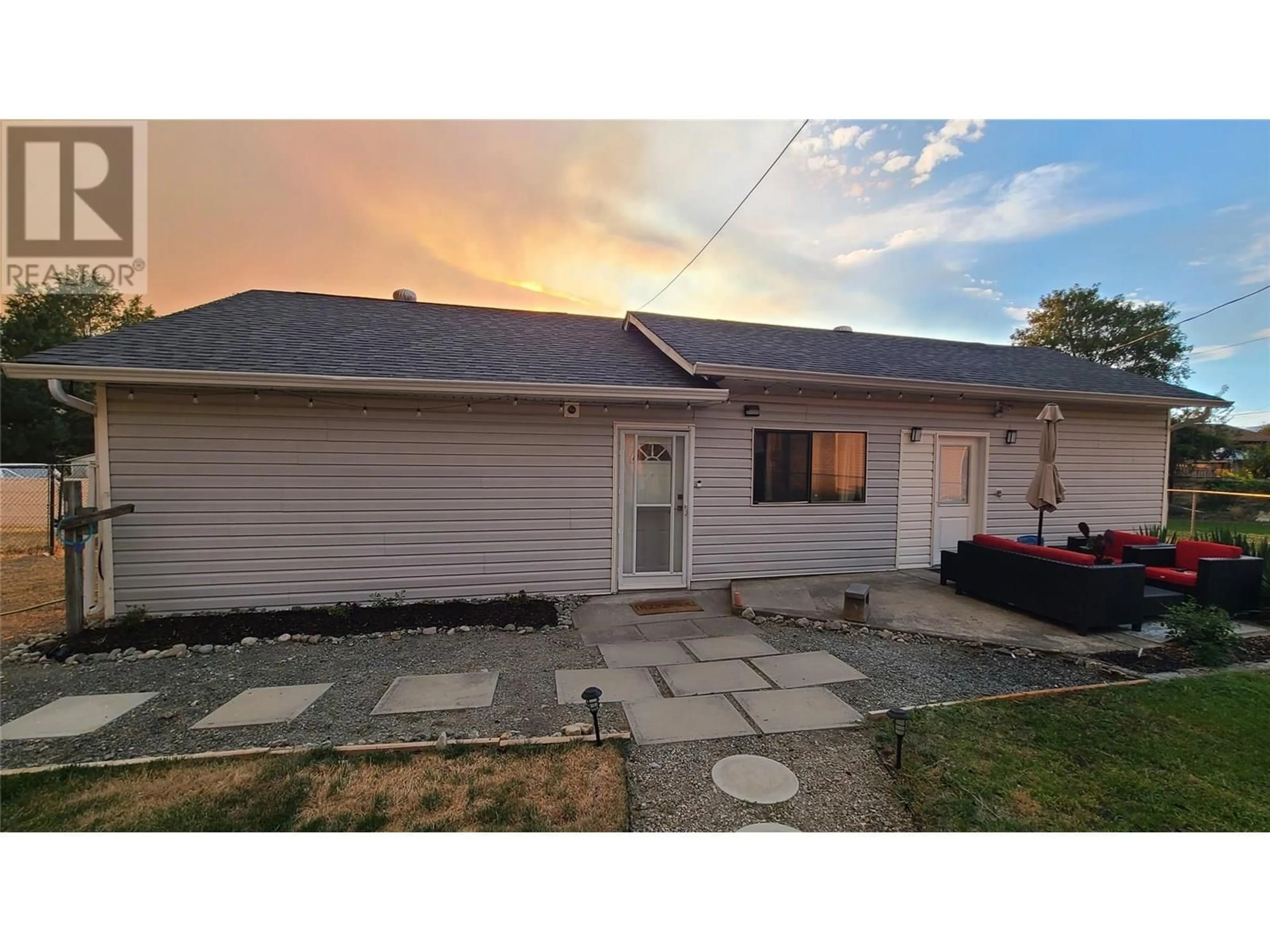 A pic from outside/outdoor area/front of a property/back of a property/a pic from drone, street for 6488 WOLFCUB PLACE, Oliver British Columbia V0H1T3