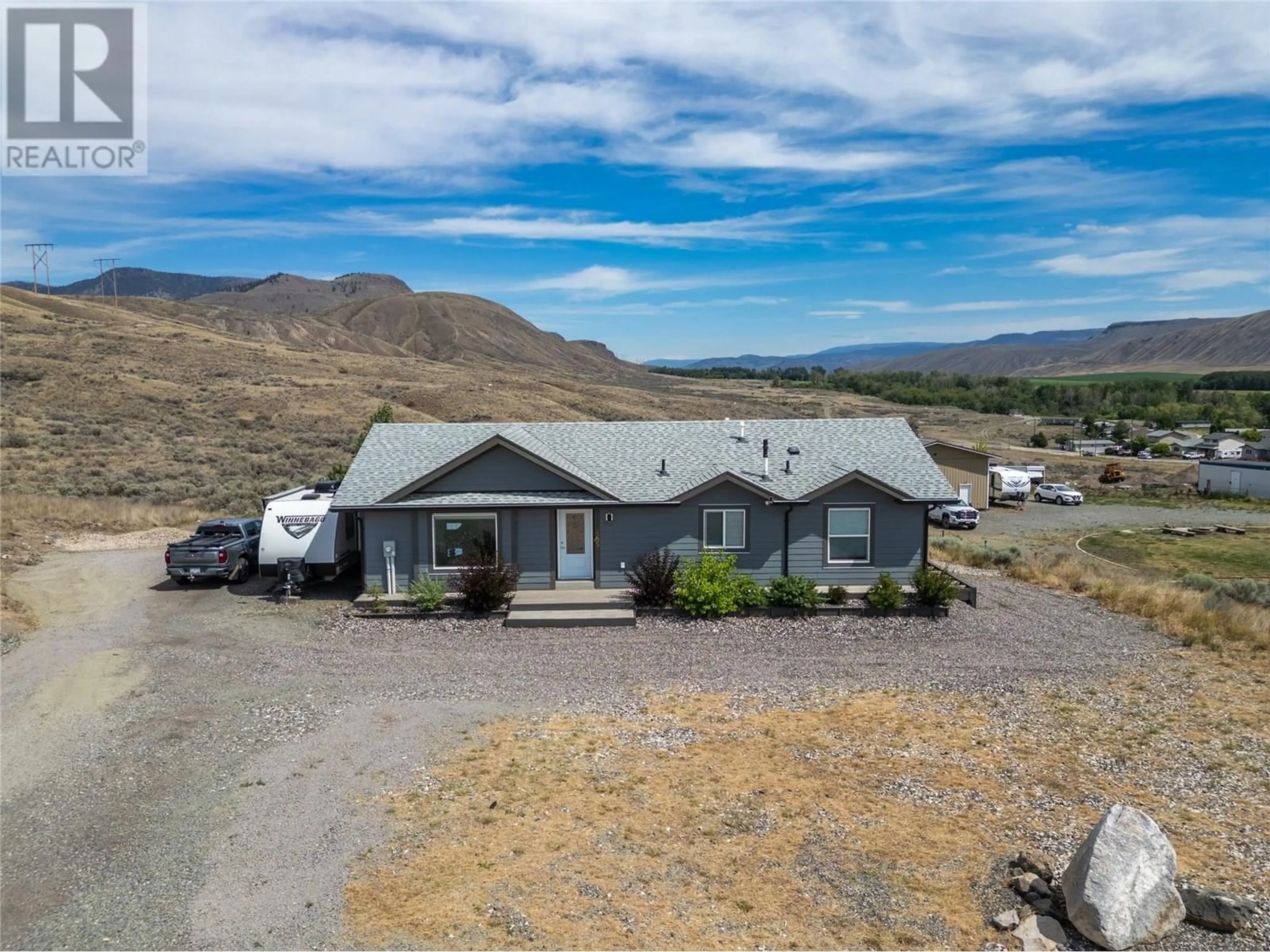 A pic from outside/outdoor area/front of a property/back of a property/a pic from drone, mountain view for 1465 LOPEZ CREEK DRIVE, Cache Creek British Columbia V0K1H0
