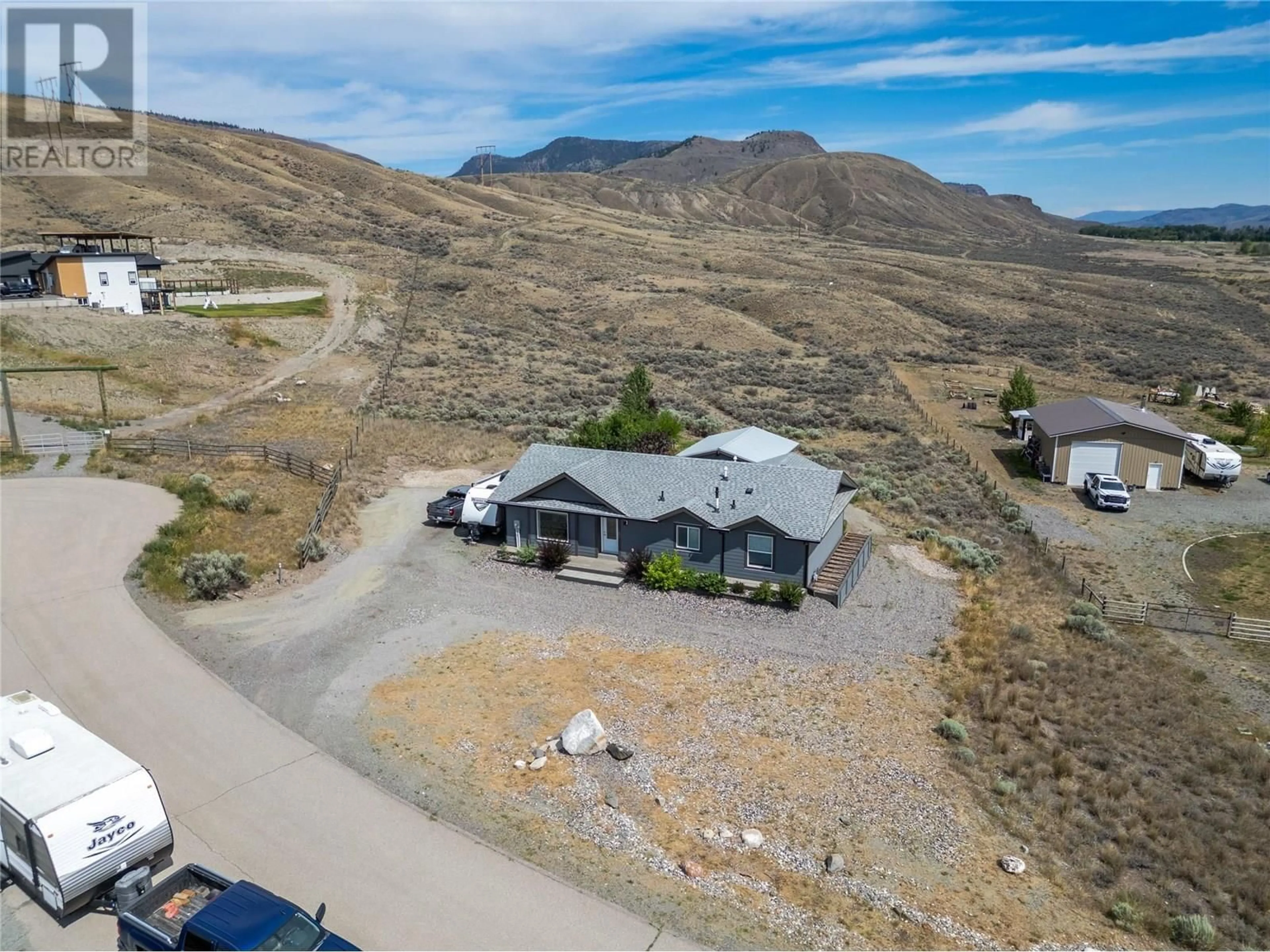 A pic from outside/outdoor area/front of a property/back of a property/a pic from drone, mountain view for 1465 LOPEZ CREEK DRIVE, Cache Creek British Columbia V0K1H0