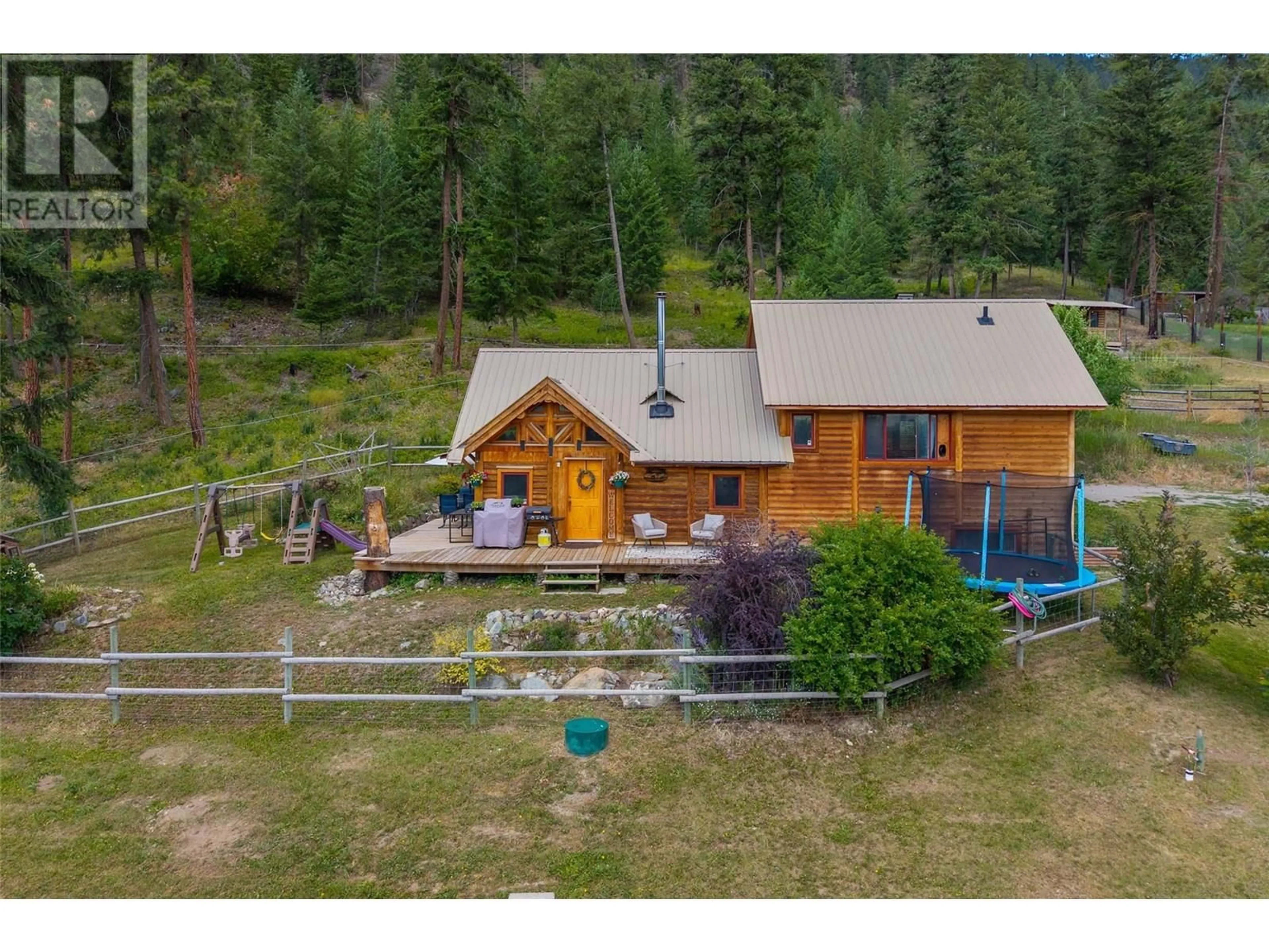 A pic from outside/outdoor area/front of a property/back of a property/a pic from drone, mountain view for 8585 WESTSYDE ROAD, Kamloops British Columbia V2B8S3