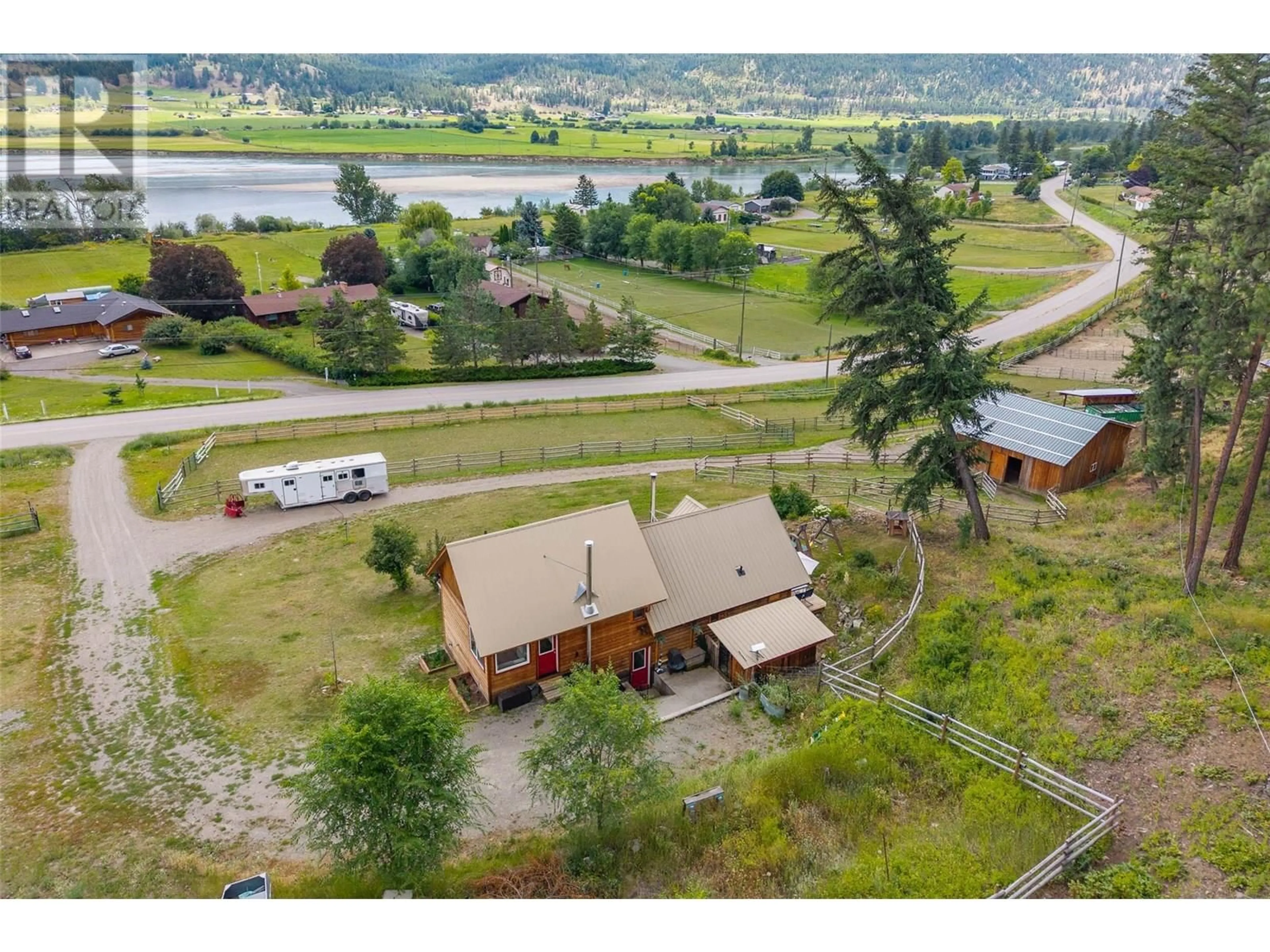 A pic from outside/outdoor area/front of a property/back of a property/a pic from drone, water/lake/river/ocean view for 8585 WESTSYDE ROAD, Kamloops British Columbia V2B8S3