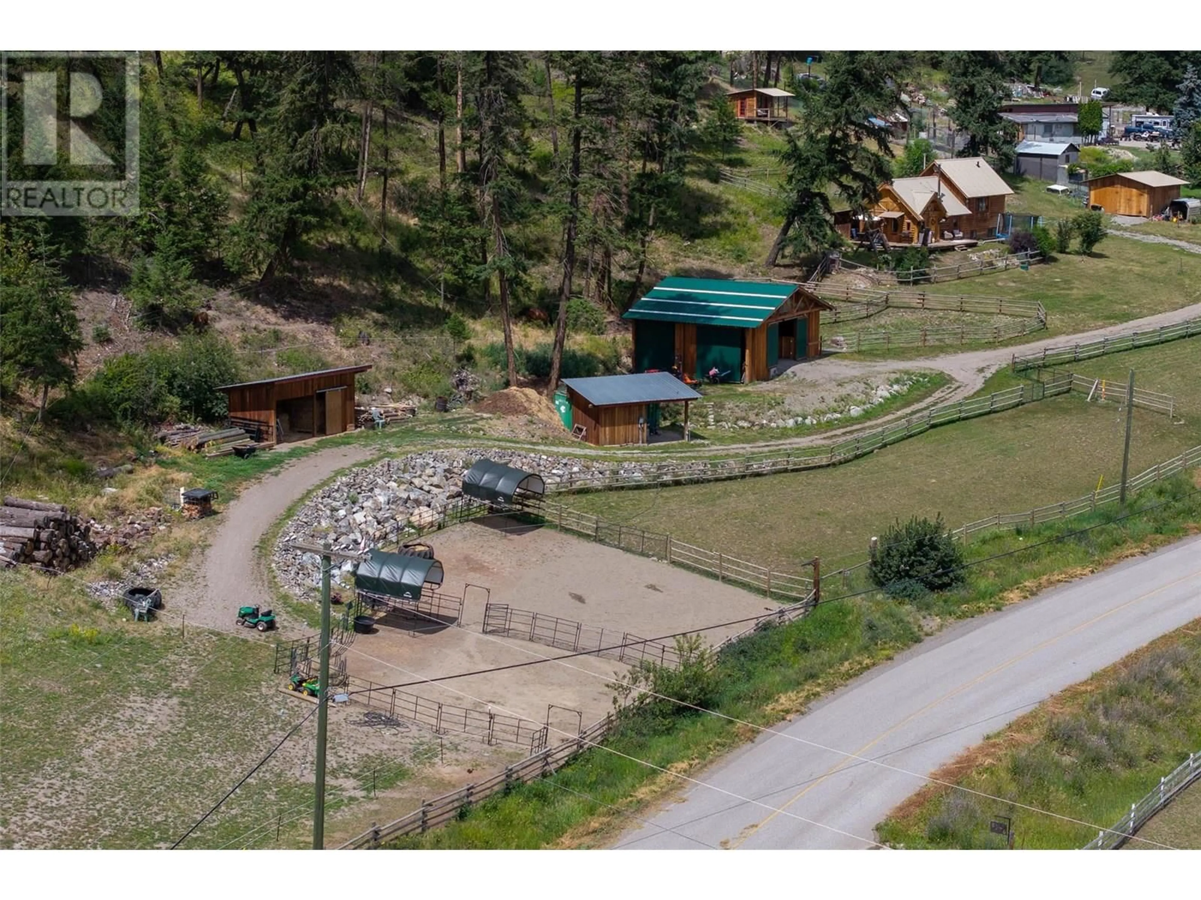 A pic from outside/outdoor area/front of a property/back of a property/a pic from drone, mountain view for 8585 WESTSYDE ROAD, Kamloops British Columbia V2B8S3
