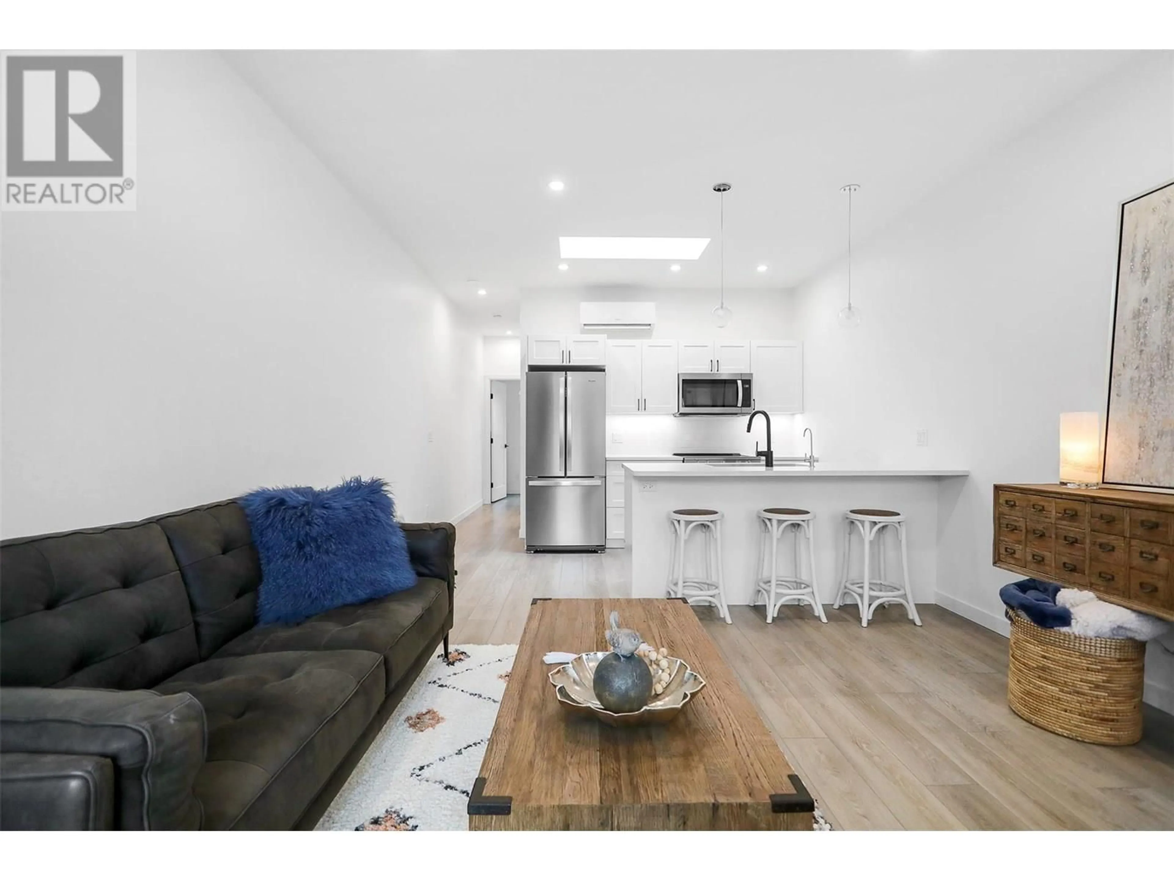 Open concept kitchen, wood/laminate floor for 219c - 8900 JIM BAILEY ROAD, Kelowna British Columbia V4V1E5