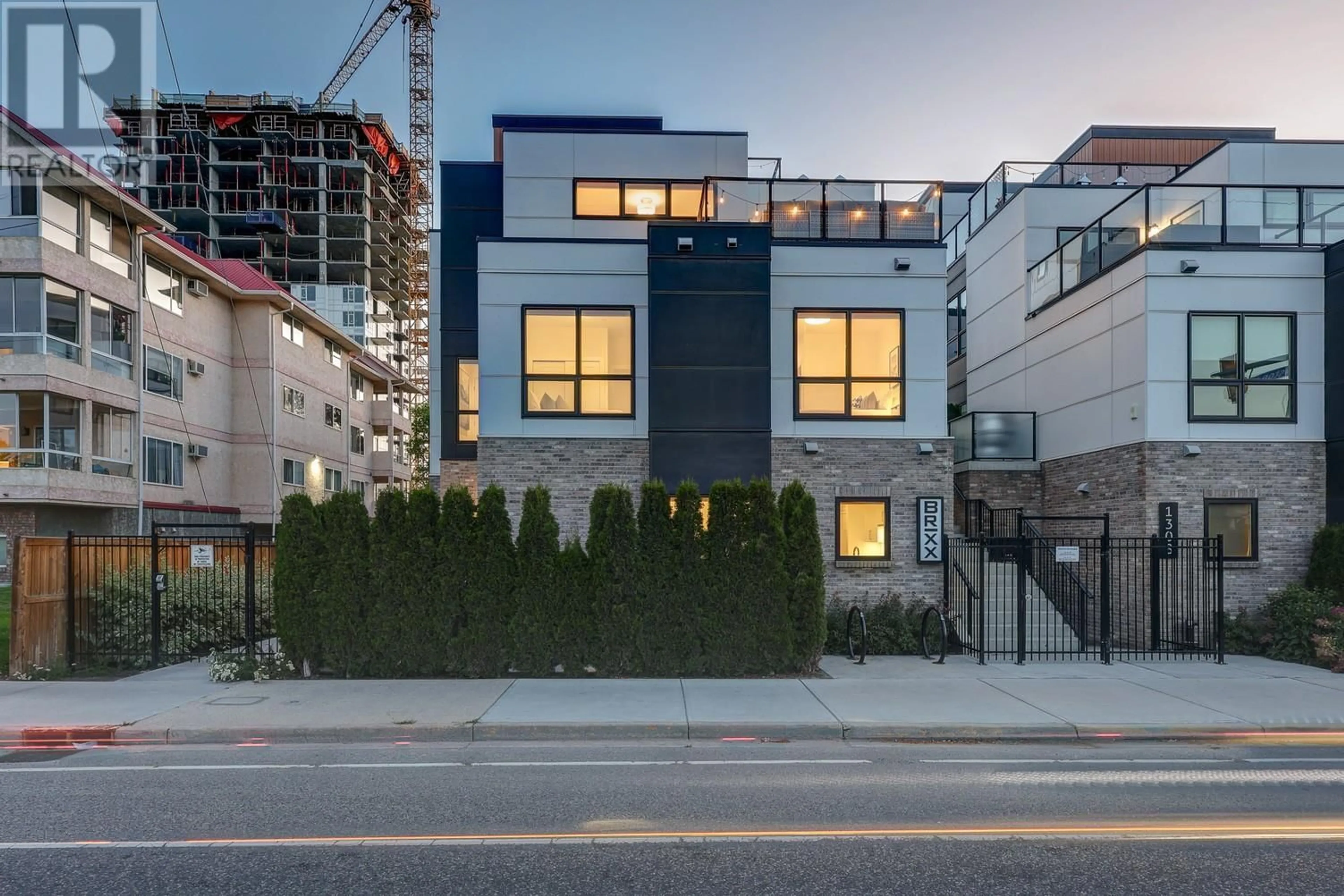 Home with brick exterior material, street for 107 - 1308 RICHTER STREET, Kelowna British Columbia V1Y2L3