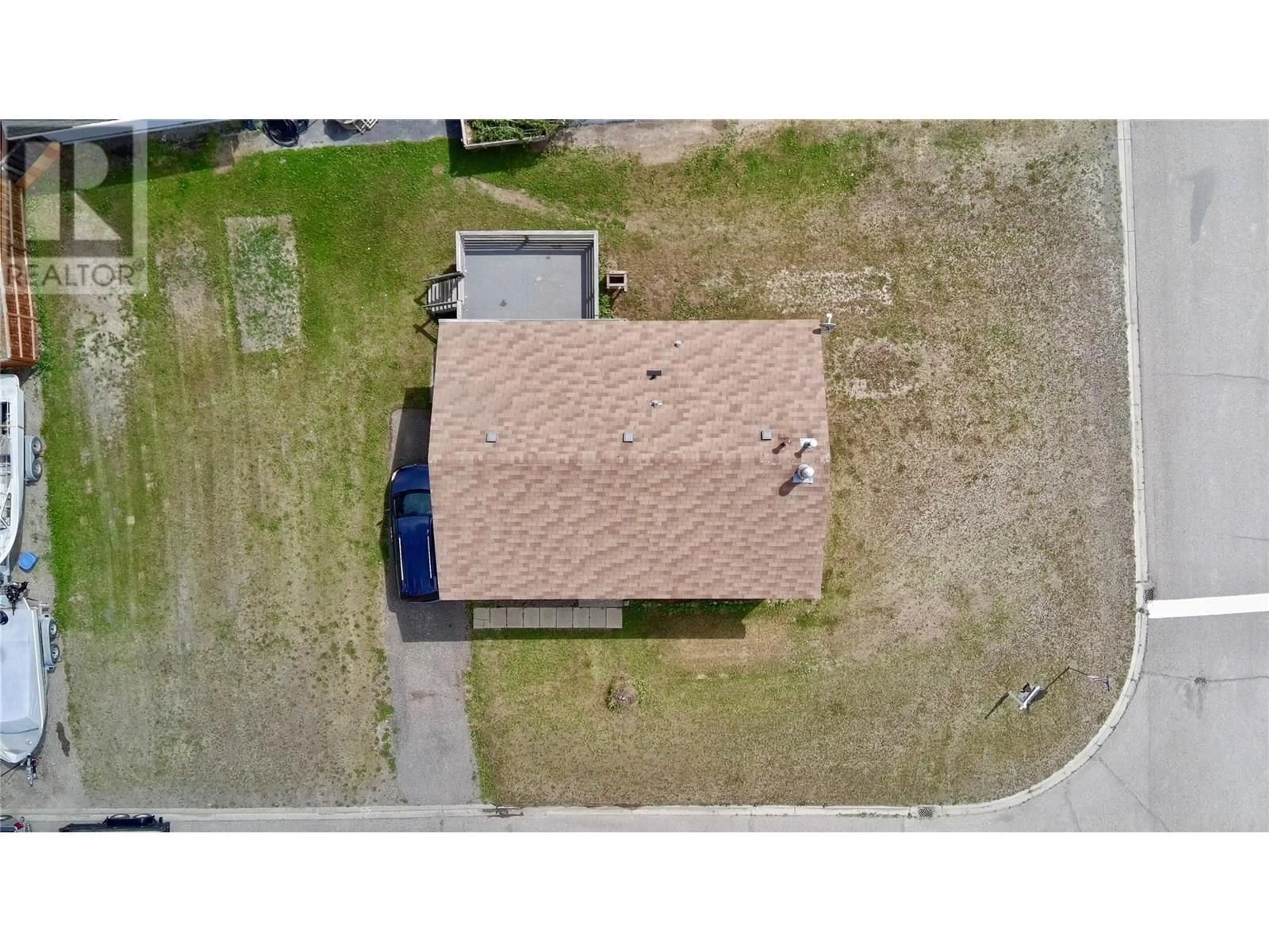 A pic from outside/outdoor area/front of a property/back of a property/a pic from drone, street for 80 SUKUNKA PLACE, Tumbler Ridge British Columbia V0C2W0