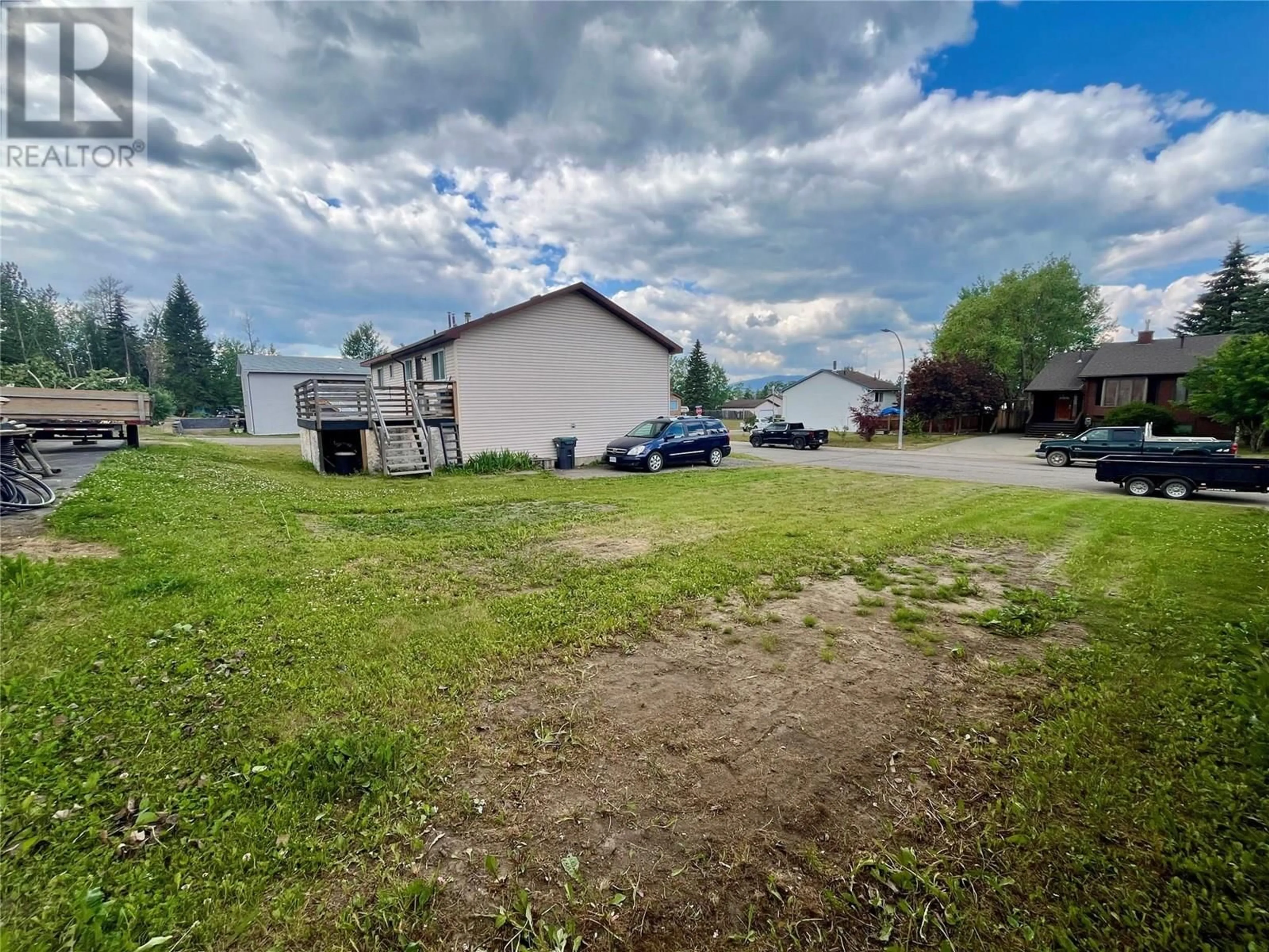 A pic from outside/outdoor area/front of a property/back of a property/a pic from drone, street for 80 SUKUNKA PLACE, Tumbler Ridge British Columbia V0C2W0