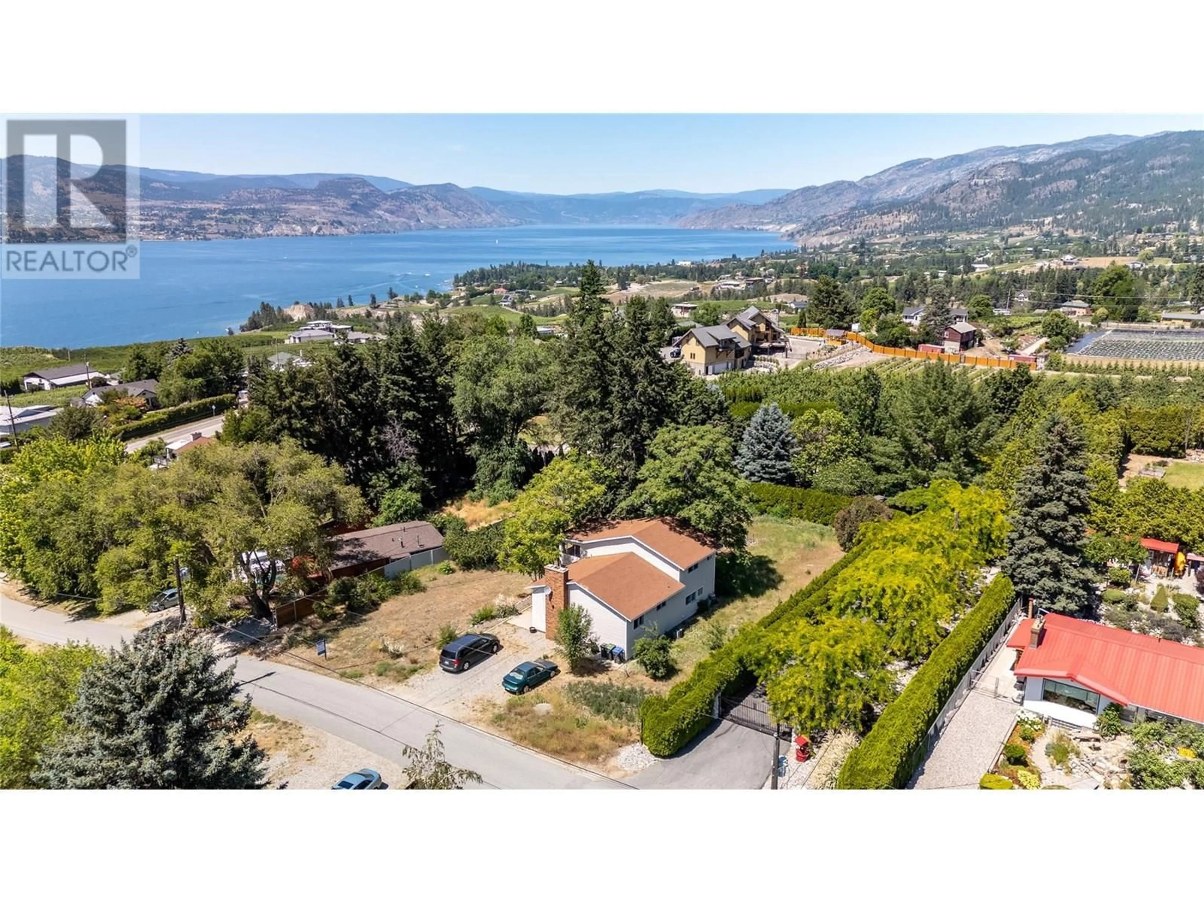 A pic from outside/outdoor area/front of a property/back of a property/a pic from drone, water/lake/river/ocean view for 1145 MCPHEE ROAD, Naramata British Columbia V0H1N0