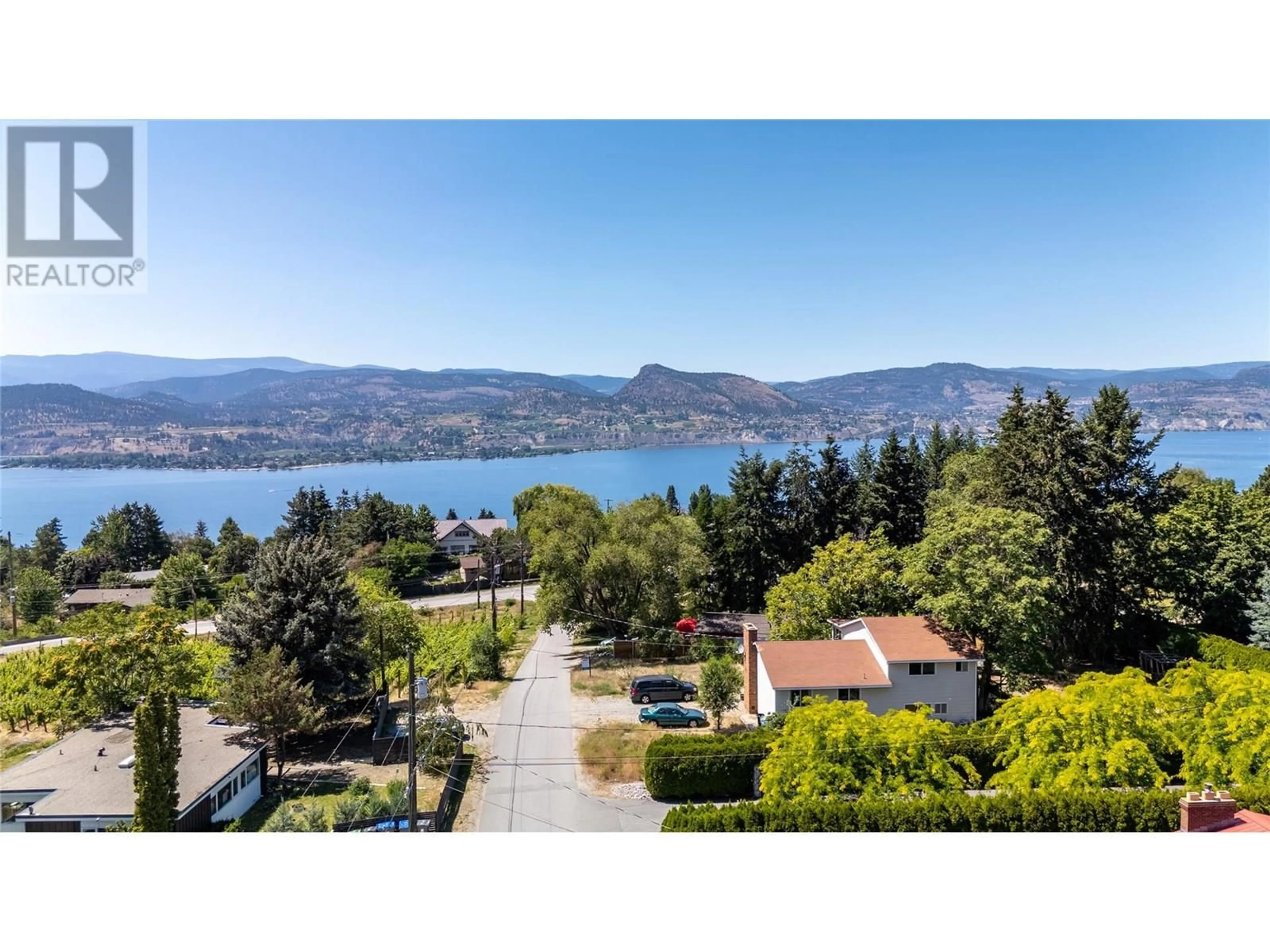 A pic from outside/outdoor area/front of a property/back of a property/a pic from drone, water/lake/river/ocean view for 1145 MCPHEE ROAD, Naramata British Columbia V0H1N0