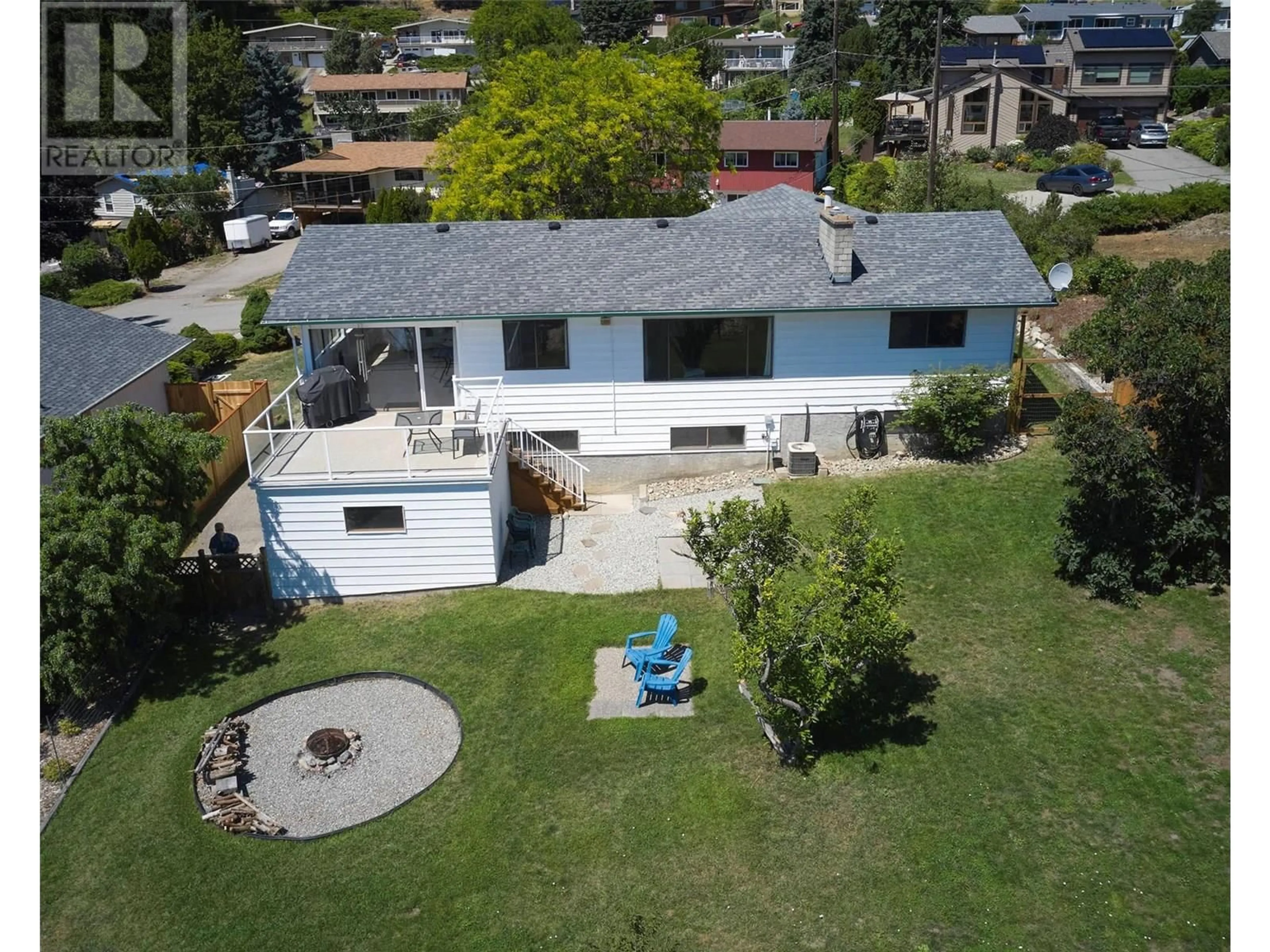 A pic from outside/outdoor area/front of a property/back of a property/a pic from drone, street for 6544 ORCHARD HILL ROAD, Vernon British Columbia V1H1B6