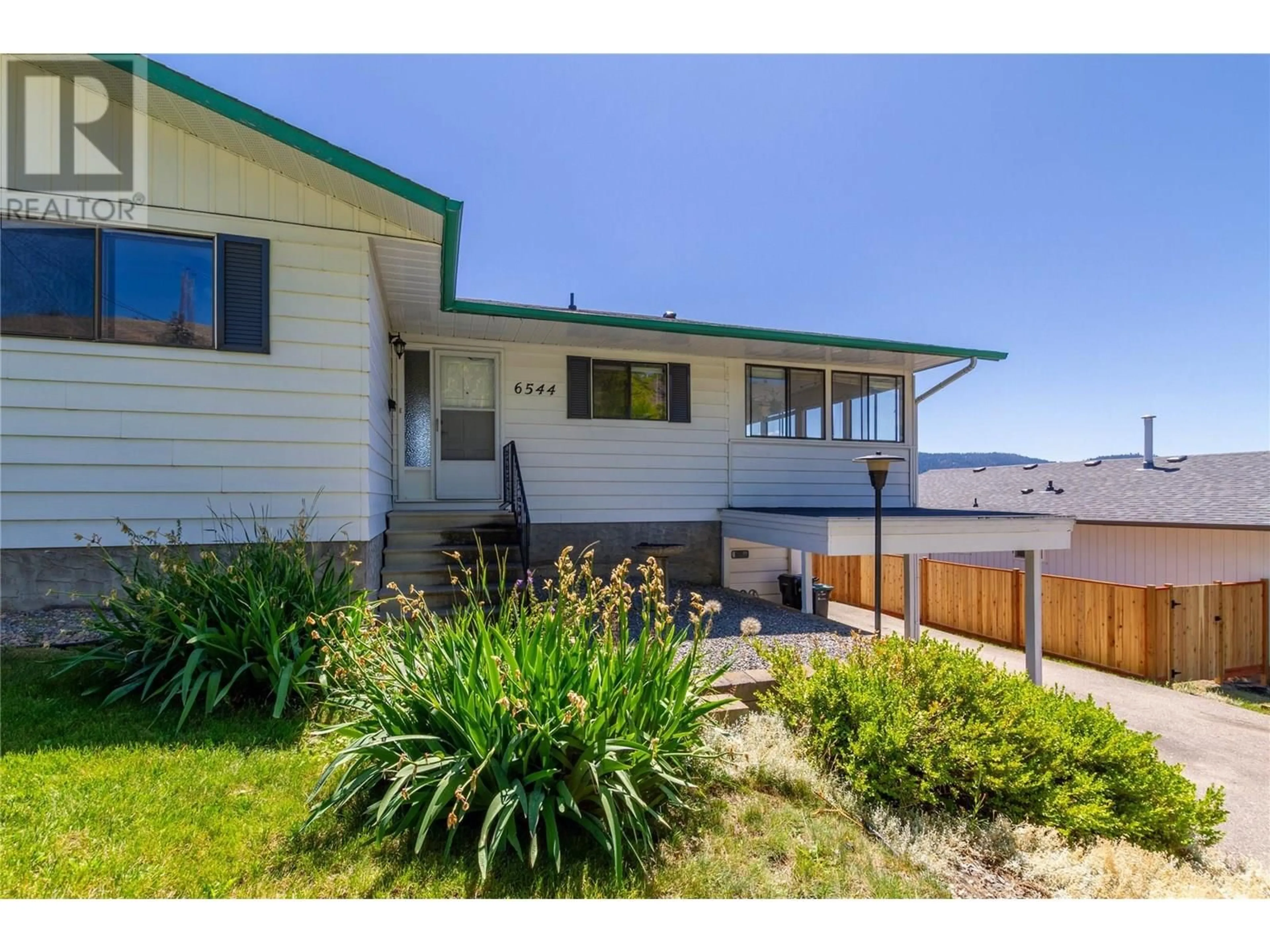 A pic from outside/outdoor area/front of a property/back of a property/a pic from drone, unknown for 6544 ORCHARD HILL ROAD, Vernon British Columbia V1H1B6