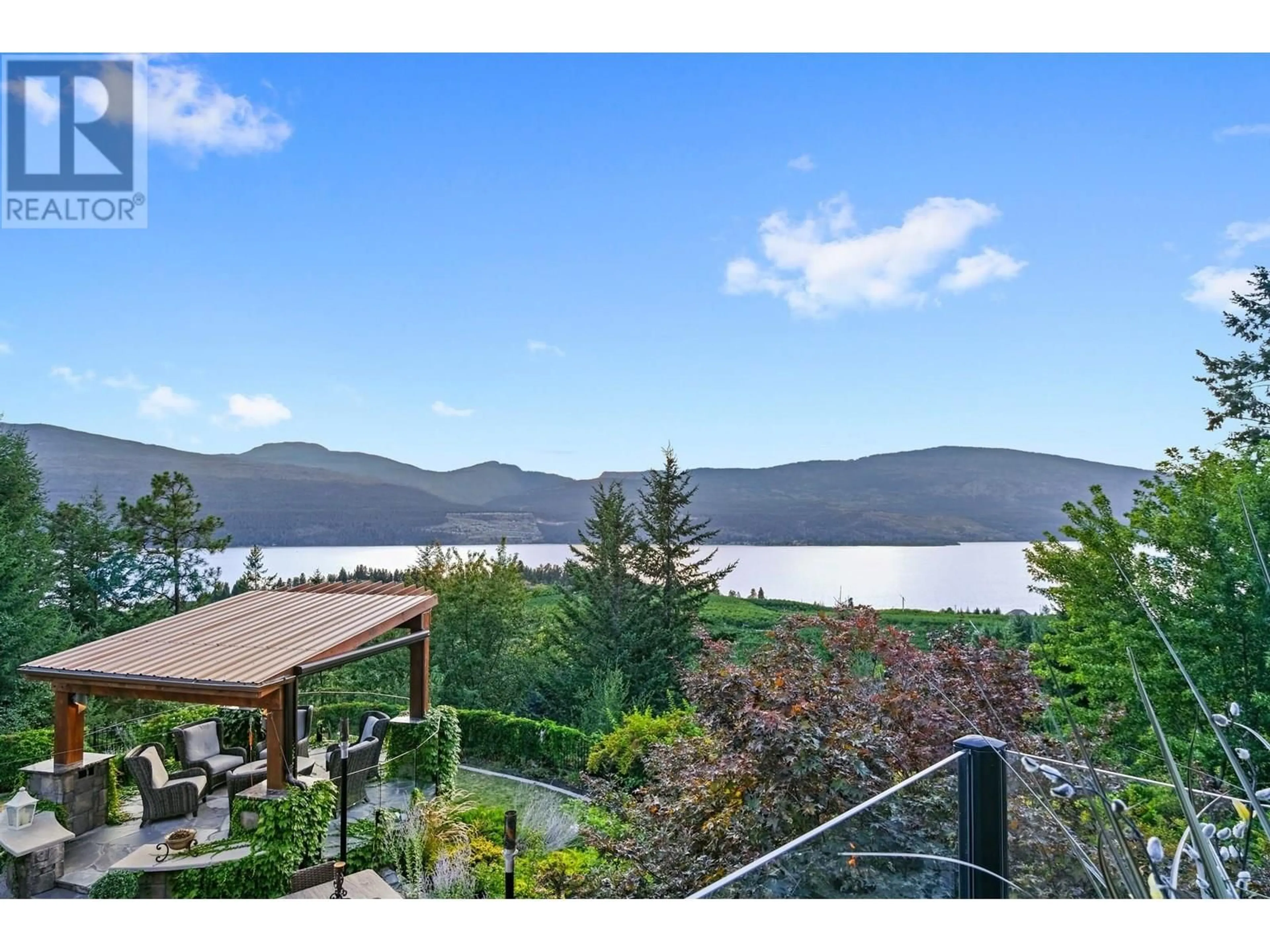 A pic from outside/outdoor area/front of a property/back of a property/a pic from drone, water/lake/river/ocean view for 15966 COMMONAGE ROAD, Lake Country British Columbia V4V1A8