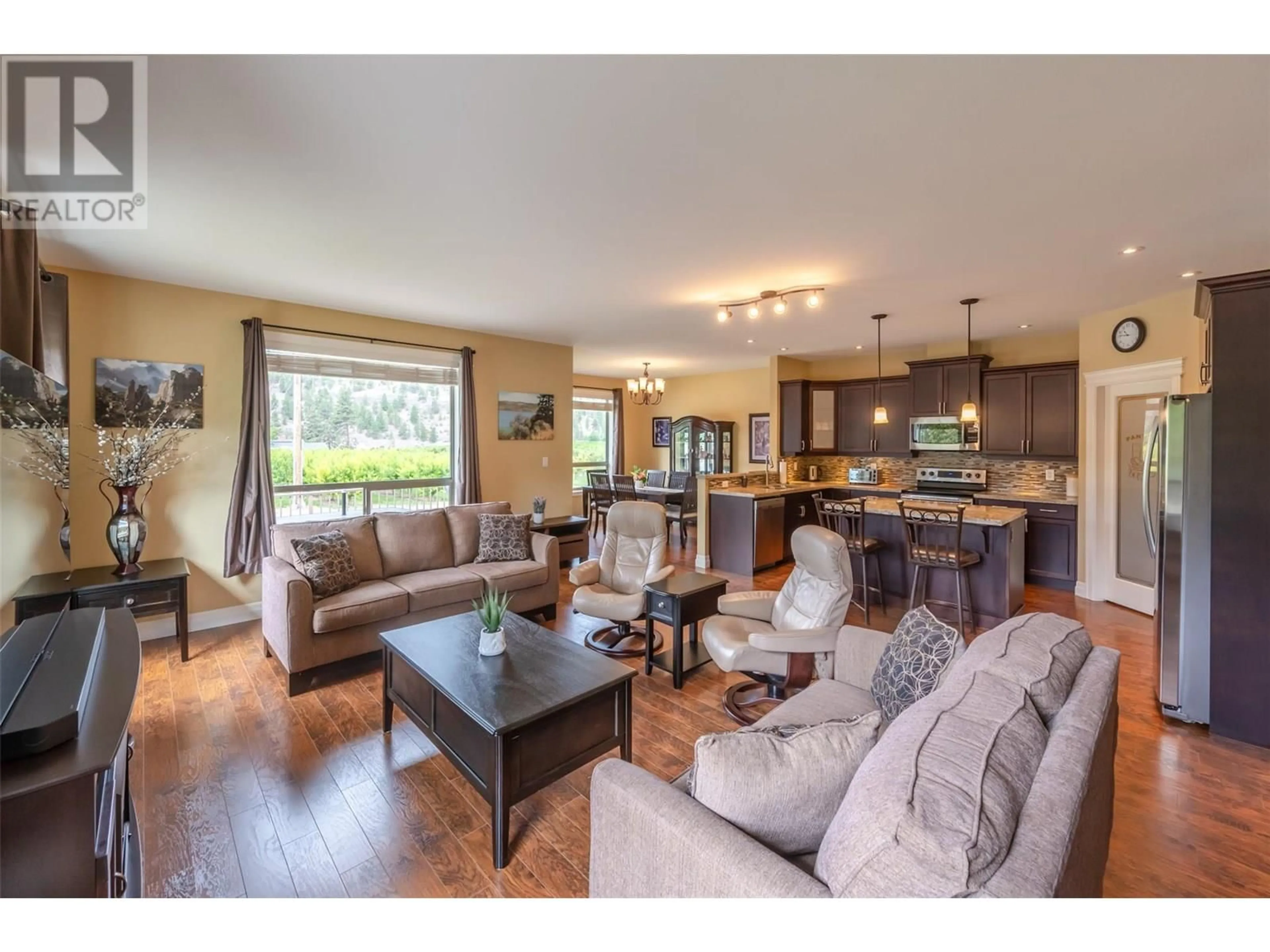 Open concept kitchen, wood/laminate floor for 8641 PIERRE DRIVE, Summerland British Columbia V0H1Z2