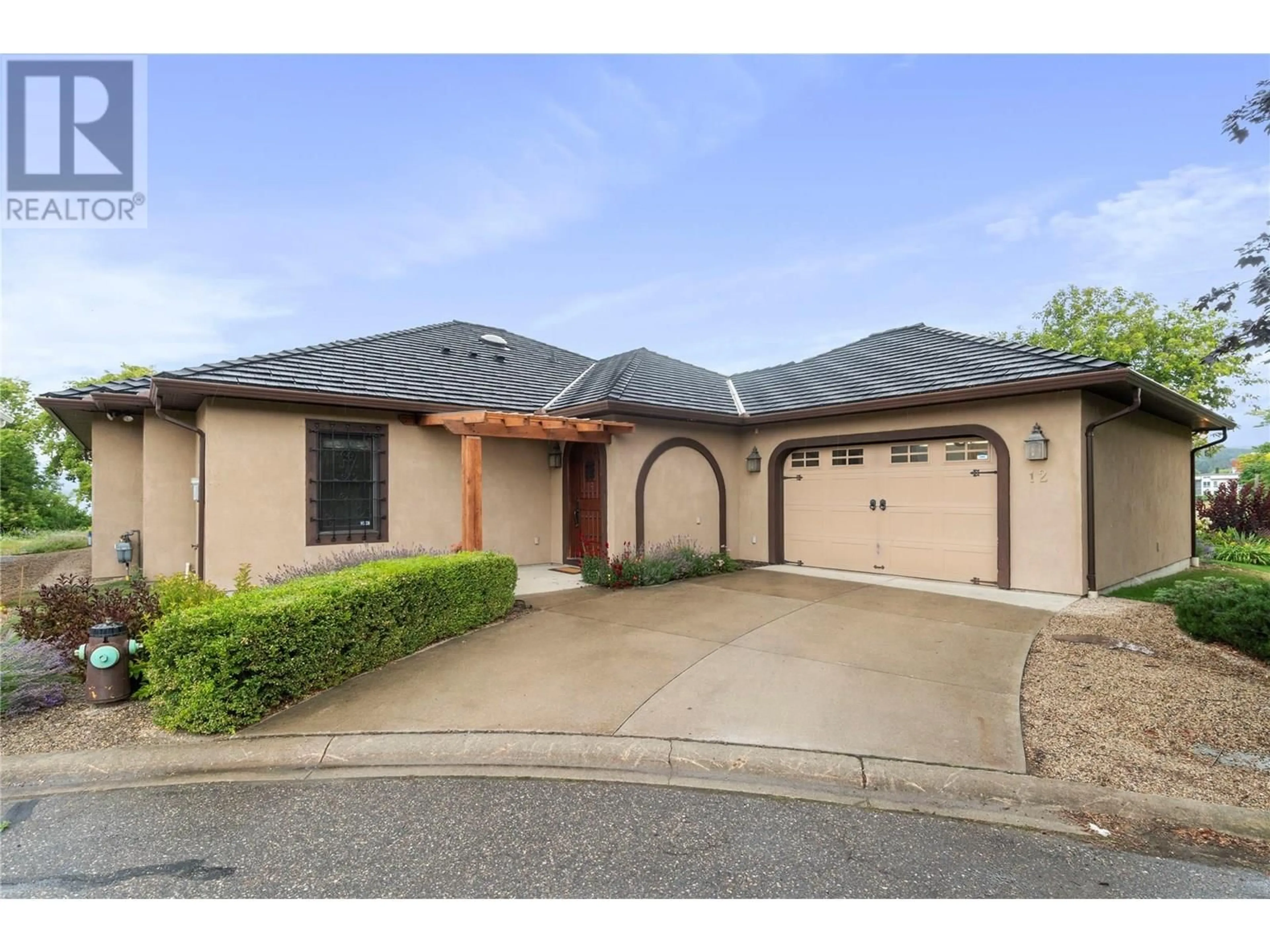 Home with brick exterior material, street for 12 - 420 HUDSON STREET NORTHWEST, Salmon Arm British Columbia V1E1P4