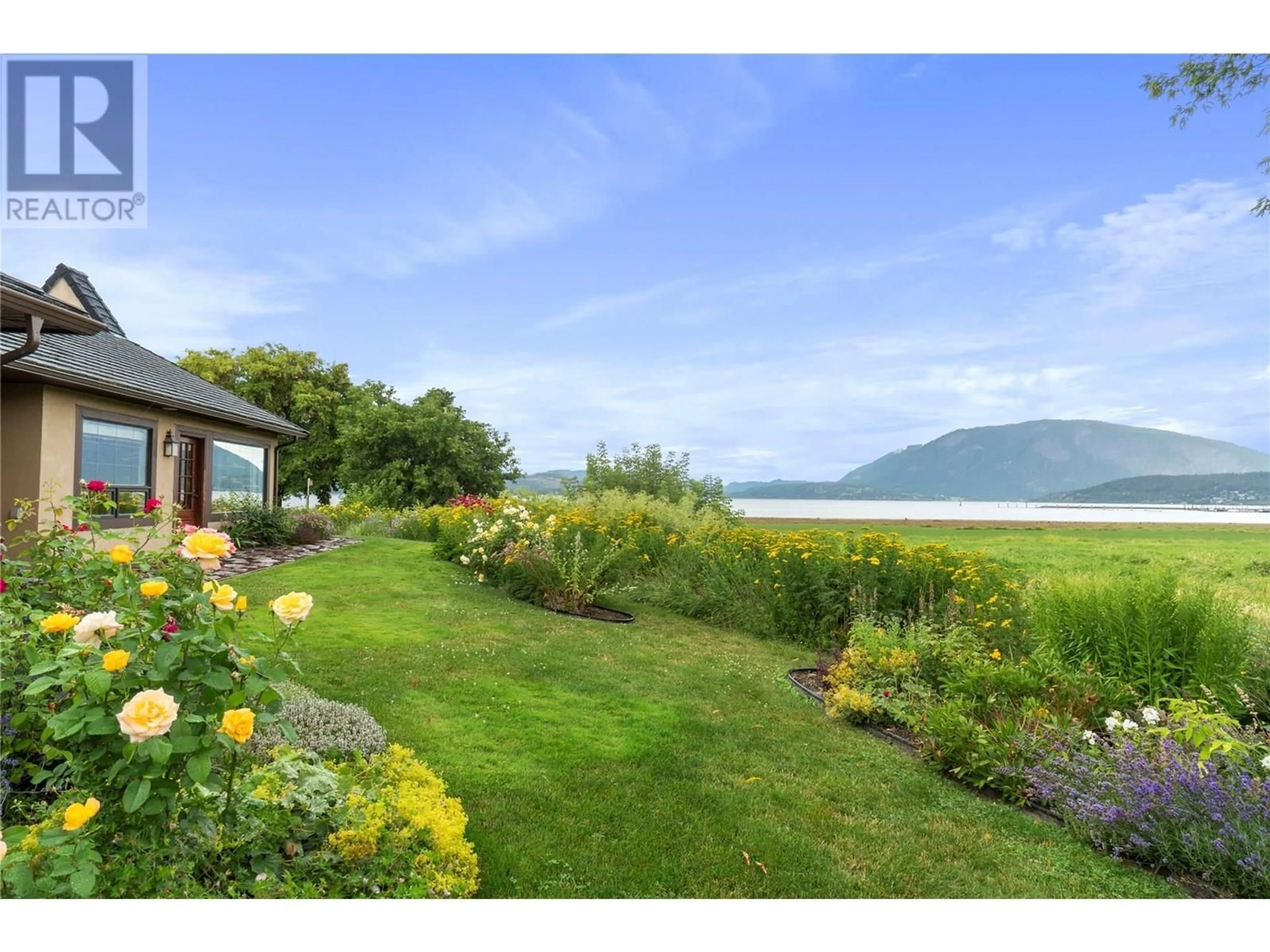 A pic from outside/outdoor area/front of a property/back of a property/a pic from drone, water/lake/river/ocean view for 12 - 420 HUDSON STREET NORTHWEST, Salmon Arm British Columbia V1E1P4