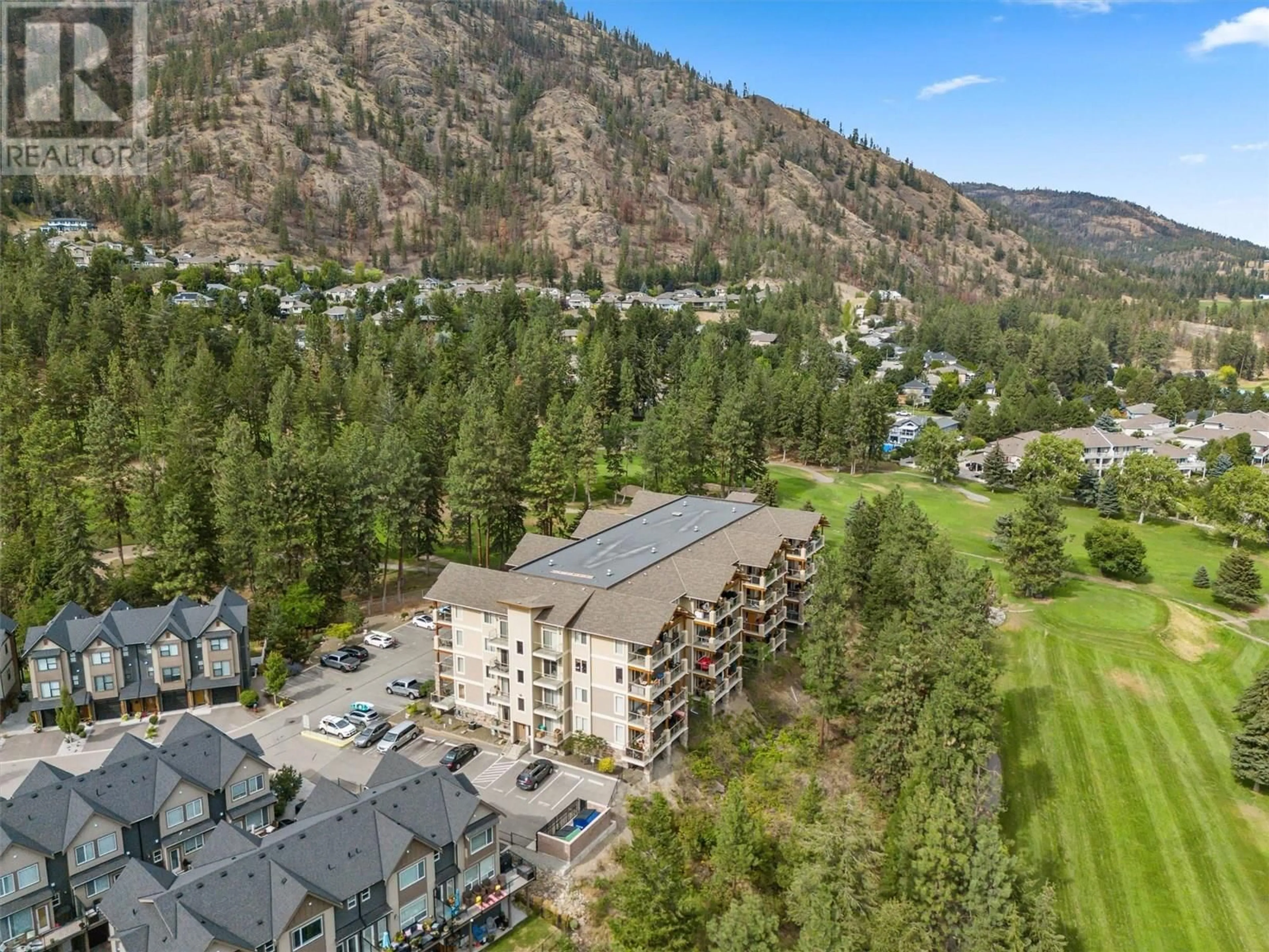 A pic from outside/outdoor area/front of a property/back of a property/a pic from drone, mountain view for 201 - 2470 TUSCANY DRIVE, West Kelowna British Columbia V4T3G8