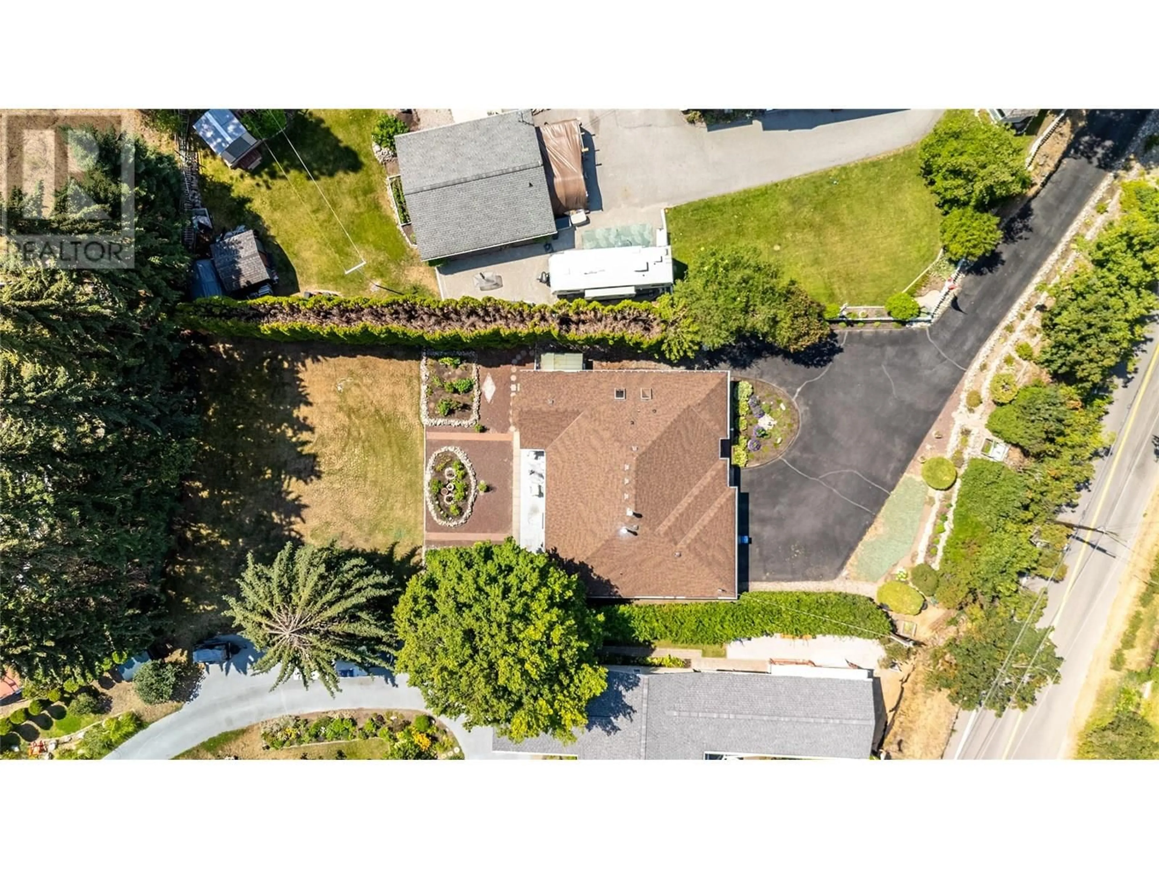 A pic from outside/outdoor area/front of a property/back of a property/a pic from drone, street for 11915 JUBILEE ROAD WEST, Summerland British Columbia V0H1Z0