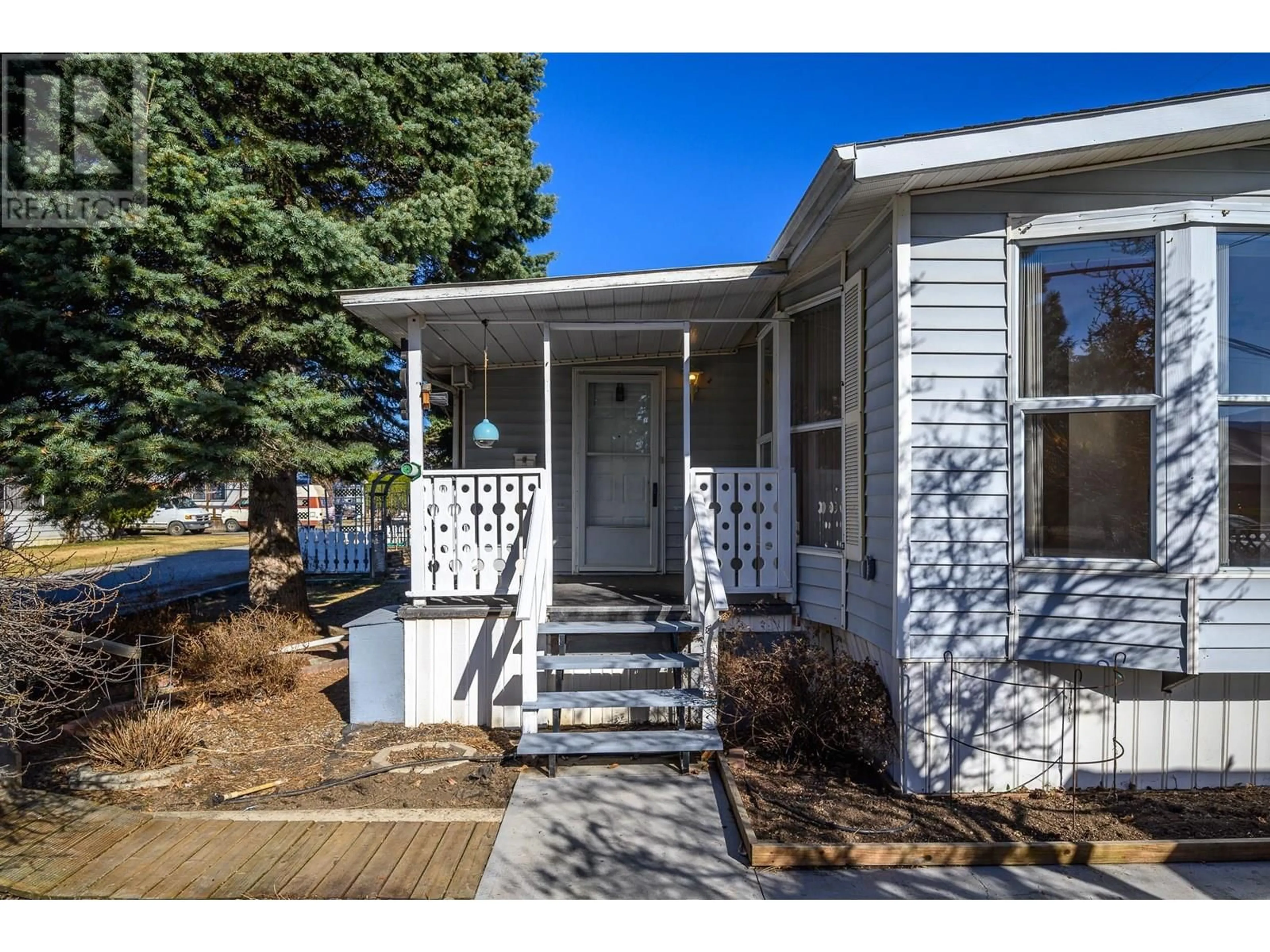 Home with vinyl exterior material, street for 108 - 720 COMMONWEALTH ROAD, Kelowna British Columbia V4V1R7